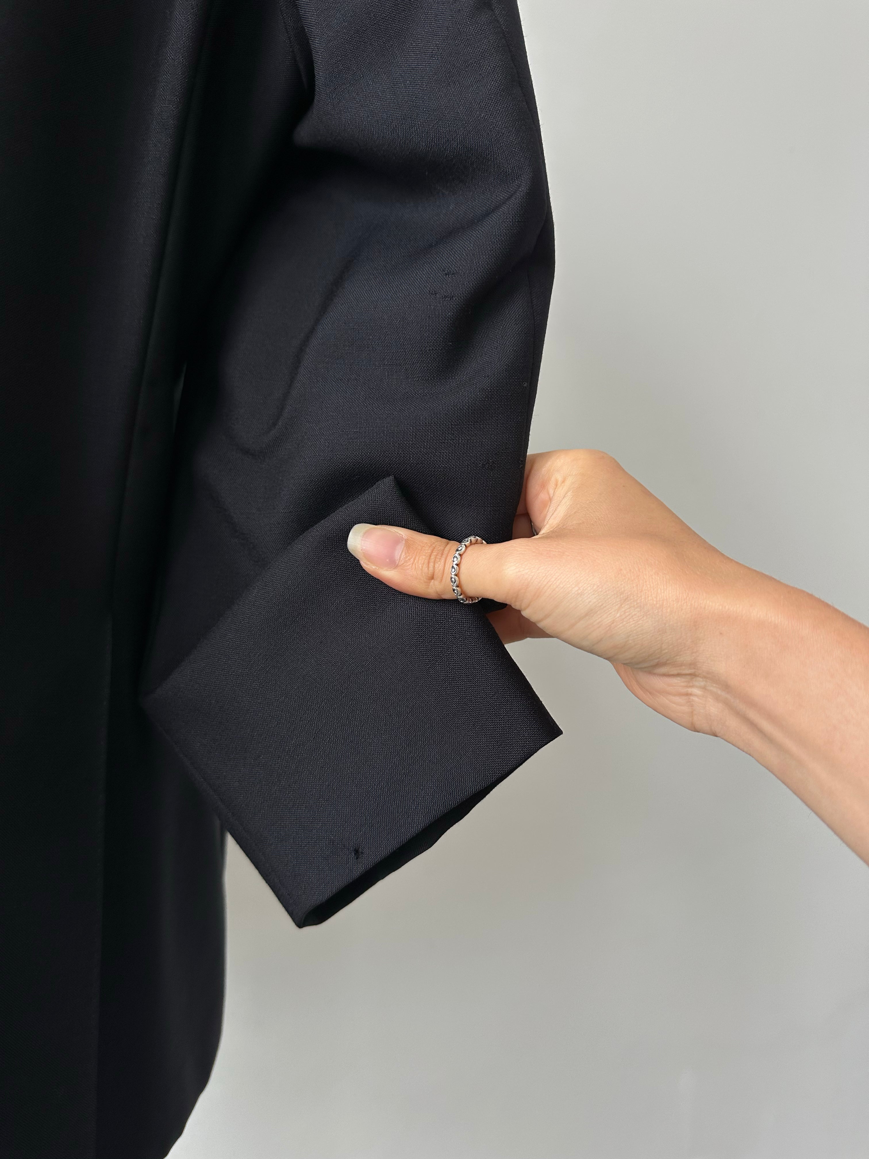 Burberry 1990s wool mohair double-breasted blazer in size L/XL, classic tailored design with plaid pattern and structured lapels.