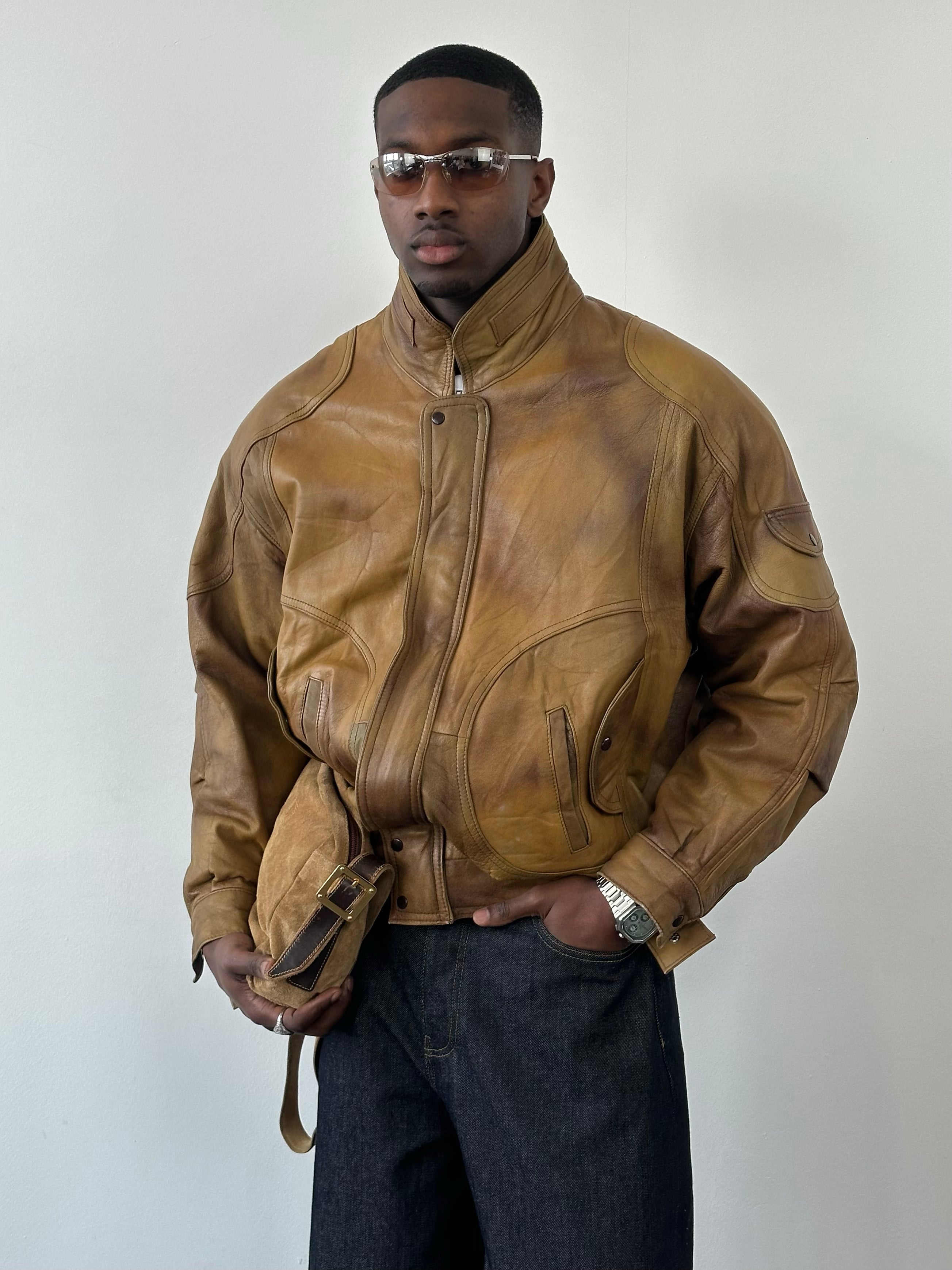 Vintage 1990s leather high neck bomber jacket, size large, with classic collar and rugged leather texture.