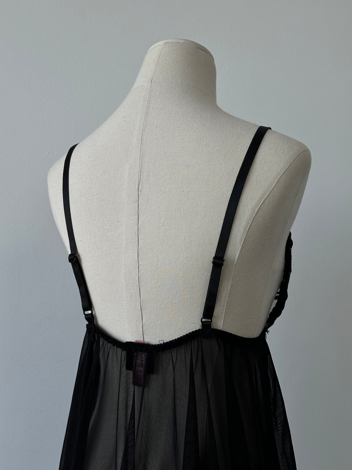 Vintage 2000s sheer lace babydoll top, M-L size, with delicate floral lace and flowy silhouette, perfect for vintage-inspired fashion.
