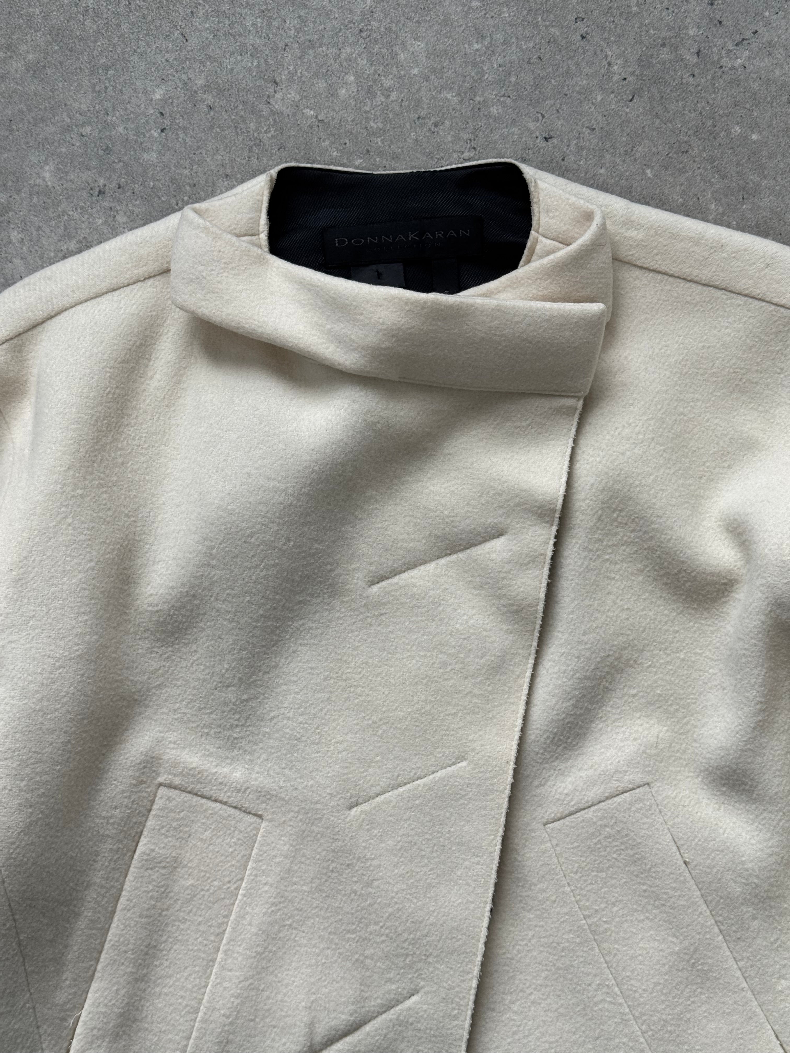 Donna Karan 2000s pure wool cropped jacket, front view showing tailored fit, collar, and long sleeves.