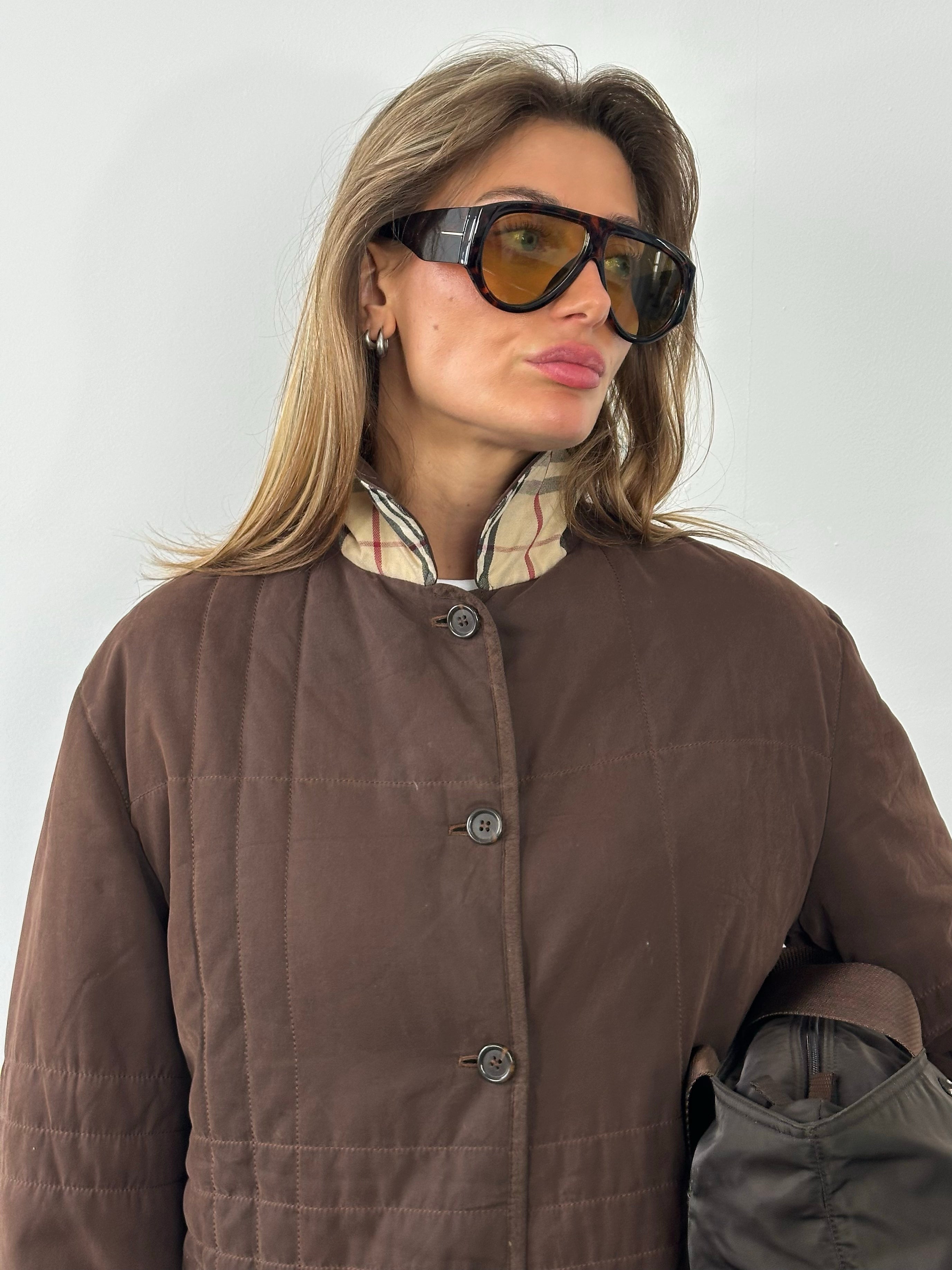 Burberry London 2000s cotton check jacket in size M, featuring classic plaid pattern and tailored fit.