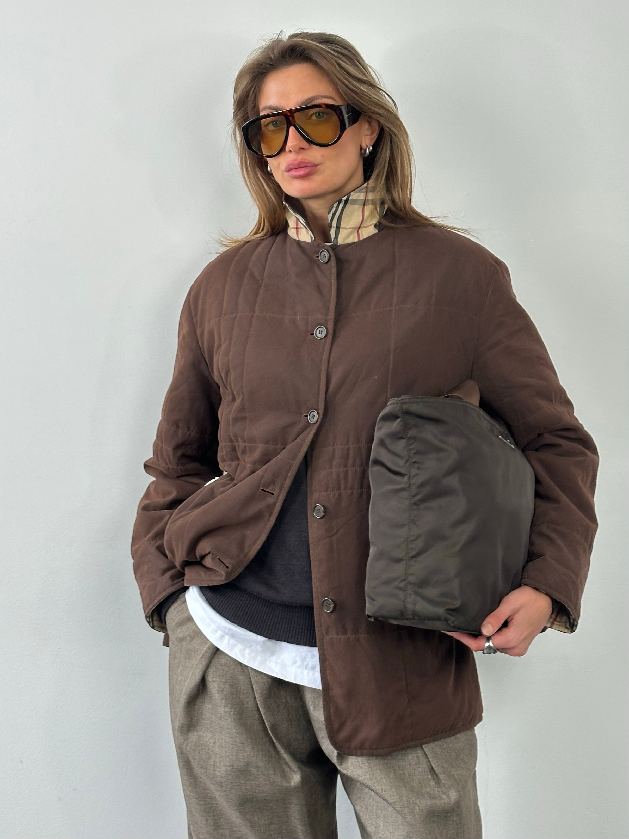 Burberry London 2000s cotton check jacket in size M, featuring classic plaid pattern and tailored fit.