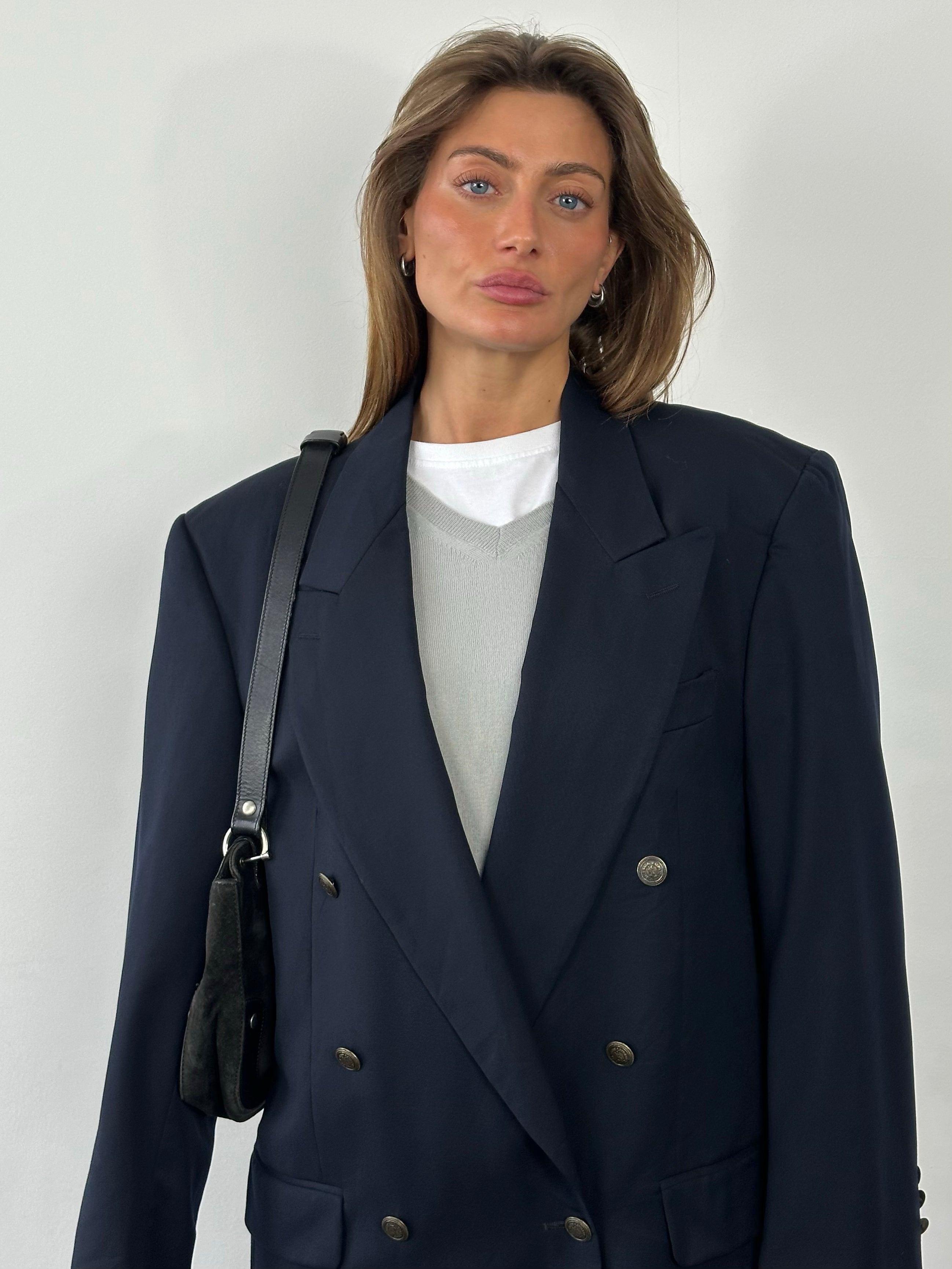 Yves Saint Laurent 1980s bespoke double-breasted wool blazer in XL/XXL, featuring classic tailoring and elegant button details.