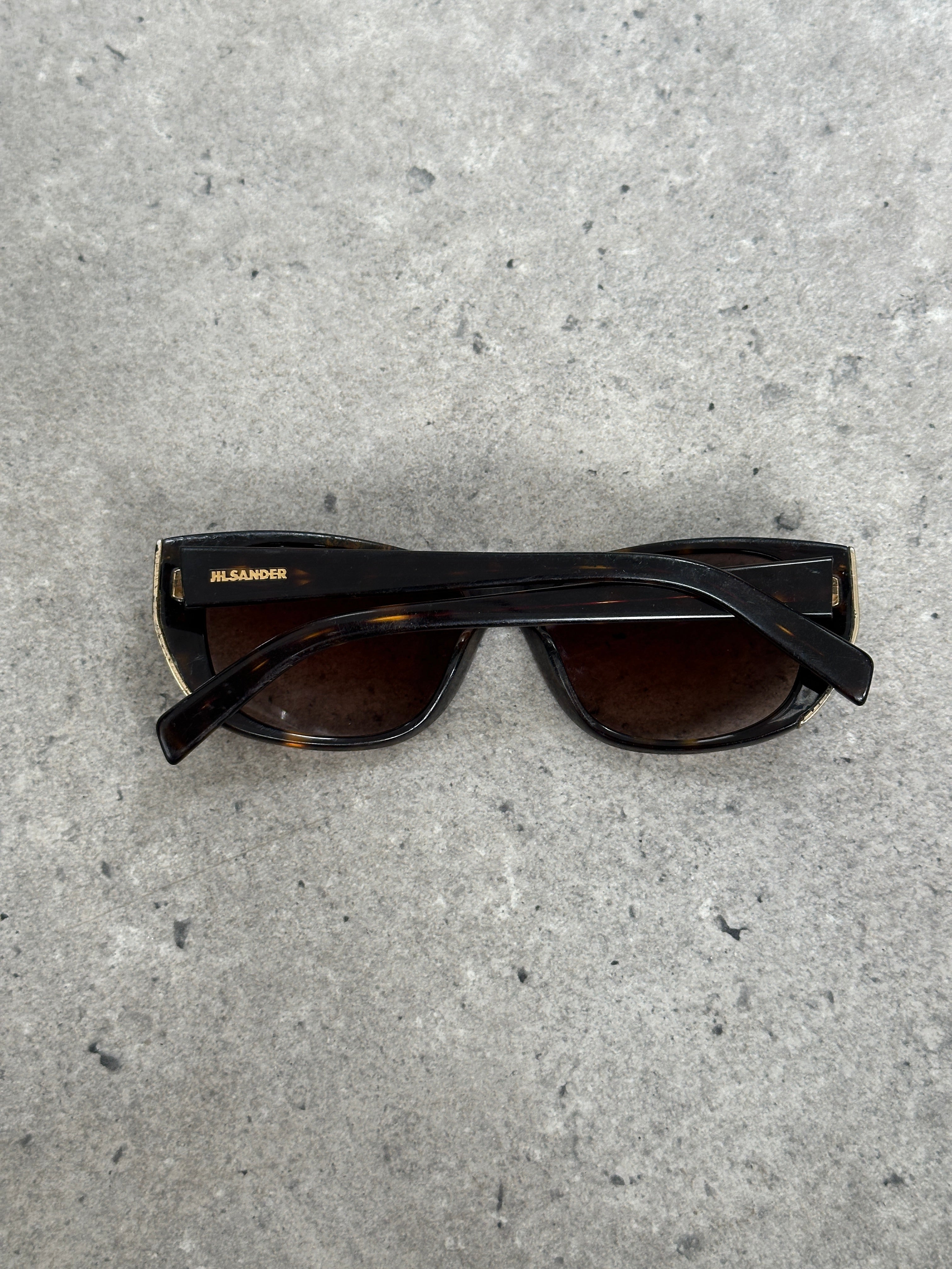 Jil Sander 2000s tortoiseshell rectangular logo sunglasses with dark lenses and bold frame design.