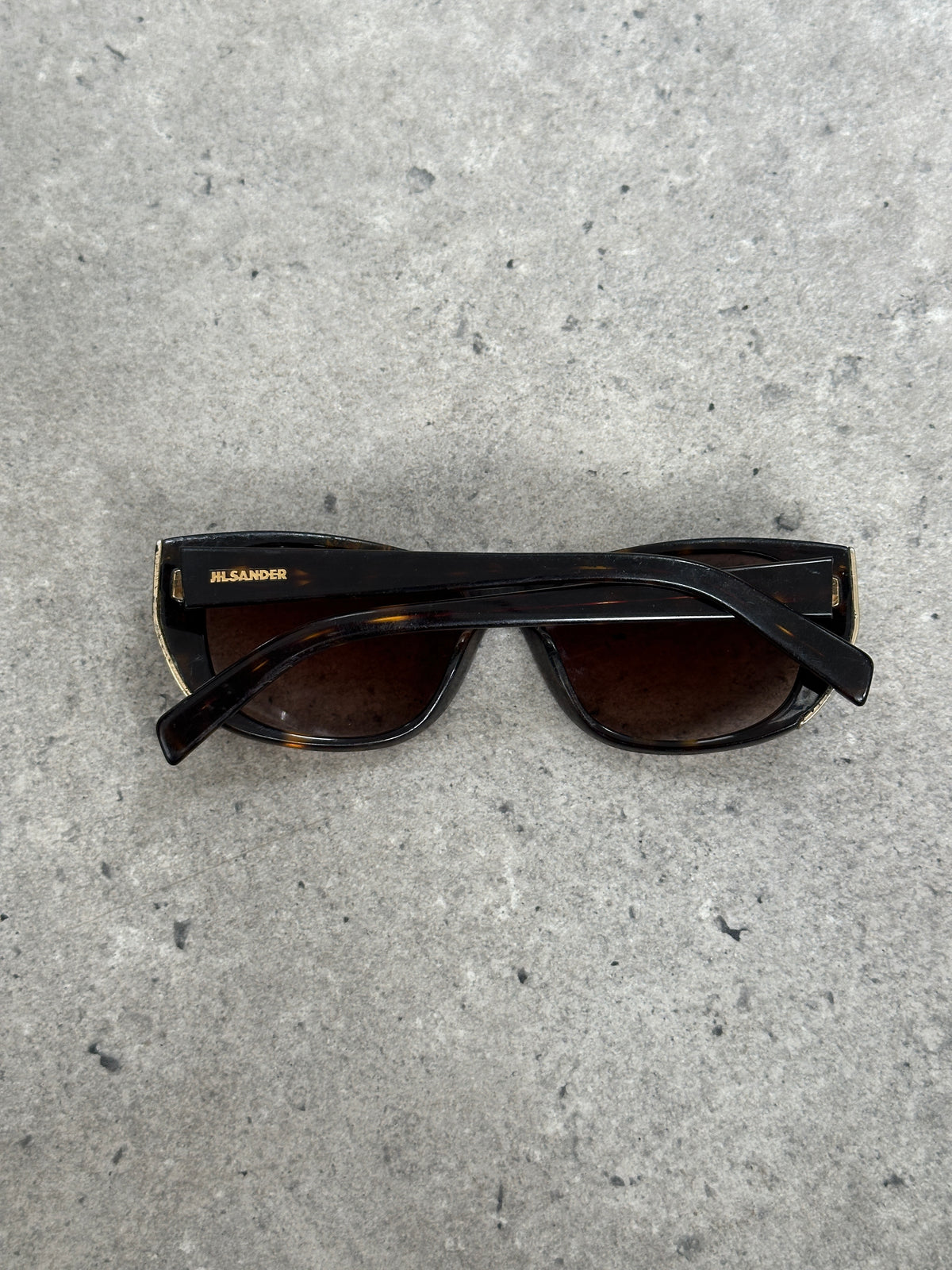 Jil Sander 2000s tortoiseshell rectangular logo sunglasses with dark lenses and bold frame design.