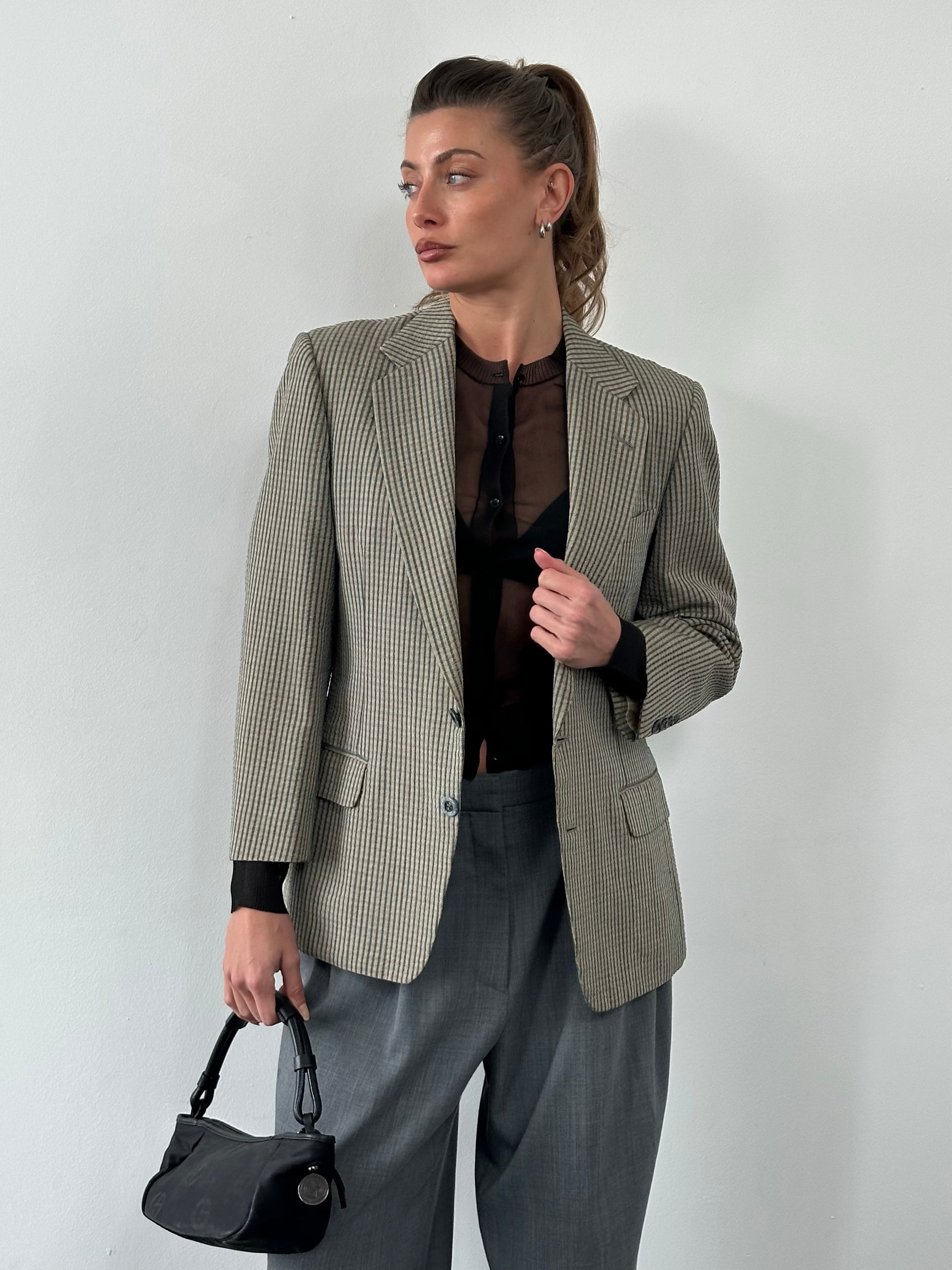 Burberry 1990s wool silk check unlined blazer in beige, with classic tailored fit and button closure, displayed on a hanger.