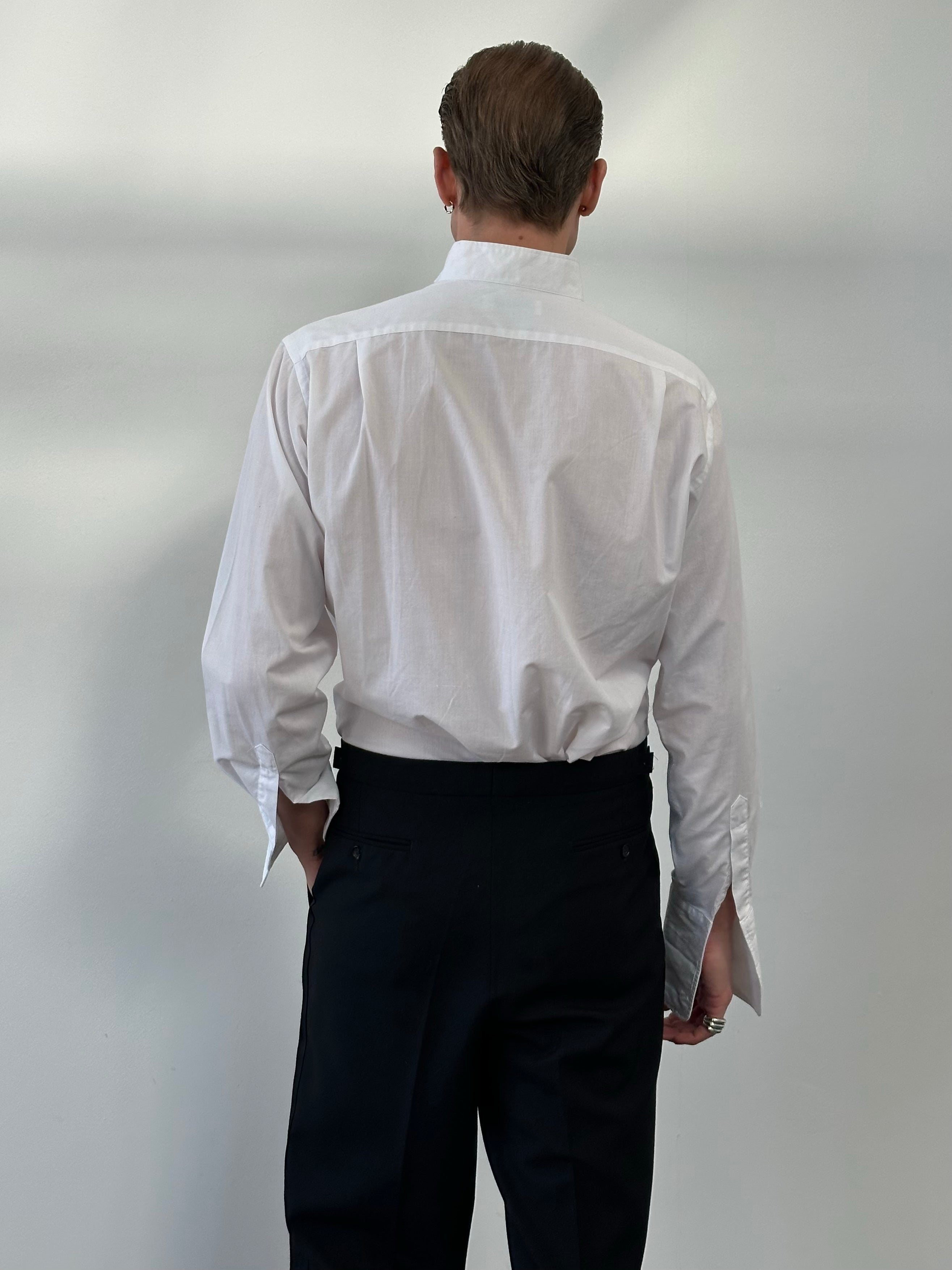 Yves Saint Laurent 1990s cotton tuxedo dress shirt, size M, with classic collar and button-up front, displayed on a hanger.