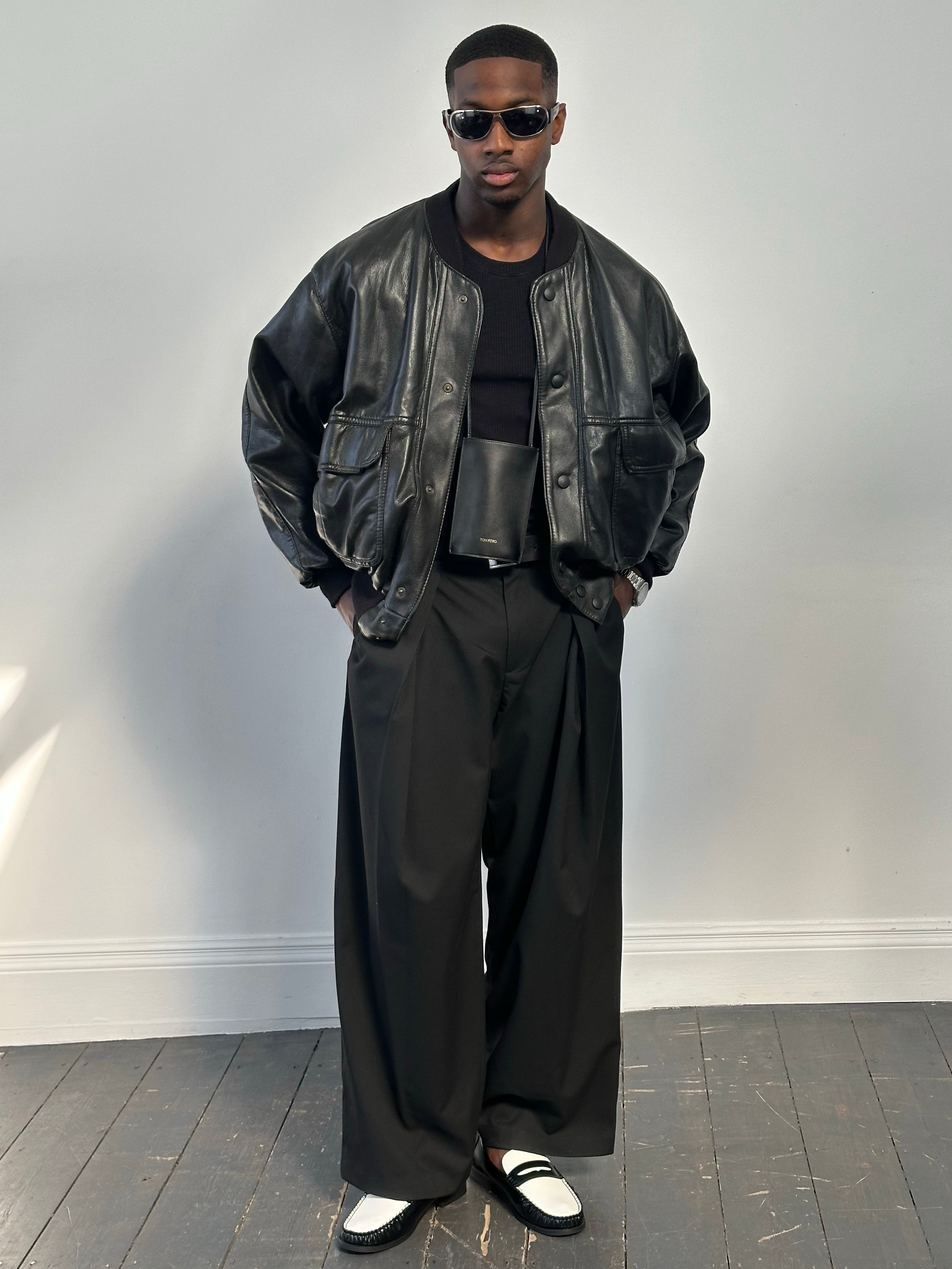 Vintage Italian 1990s leather blouson bomber jacket in XL, showcasing classic design and rich leather texture.
