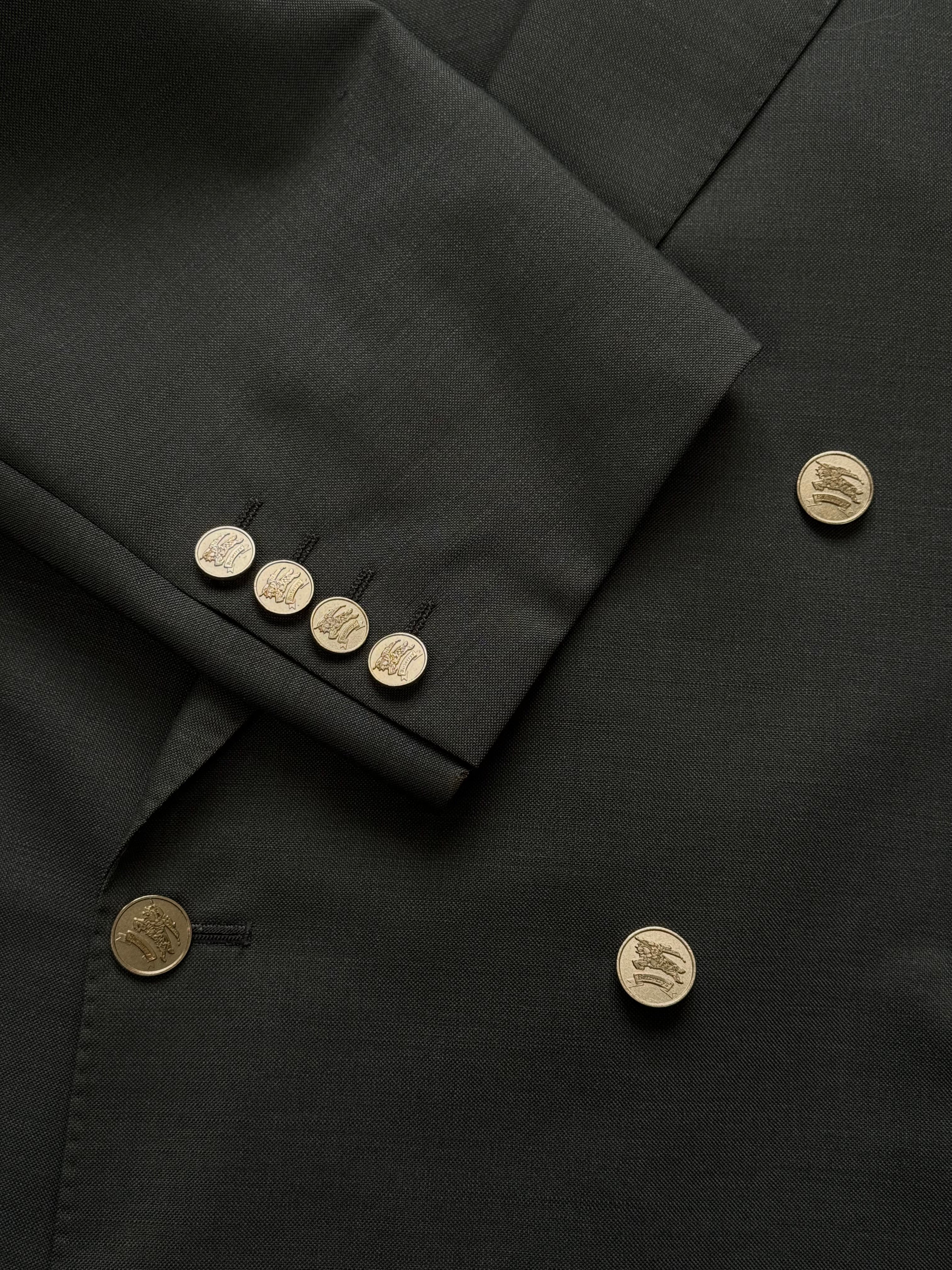 Burberry 1990s wool mohair double-breasted blazer in XL, featuring classic plaid pattern and tailored fit, on a neutral background.