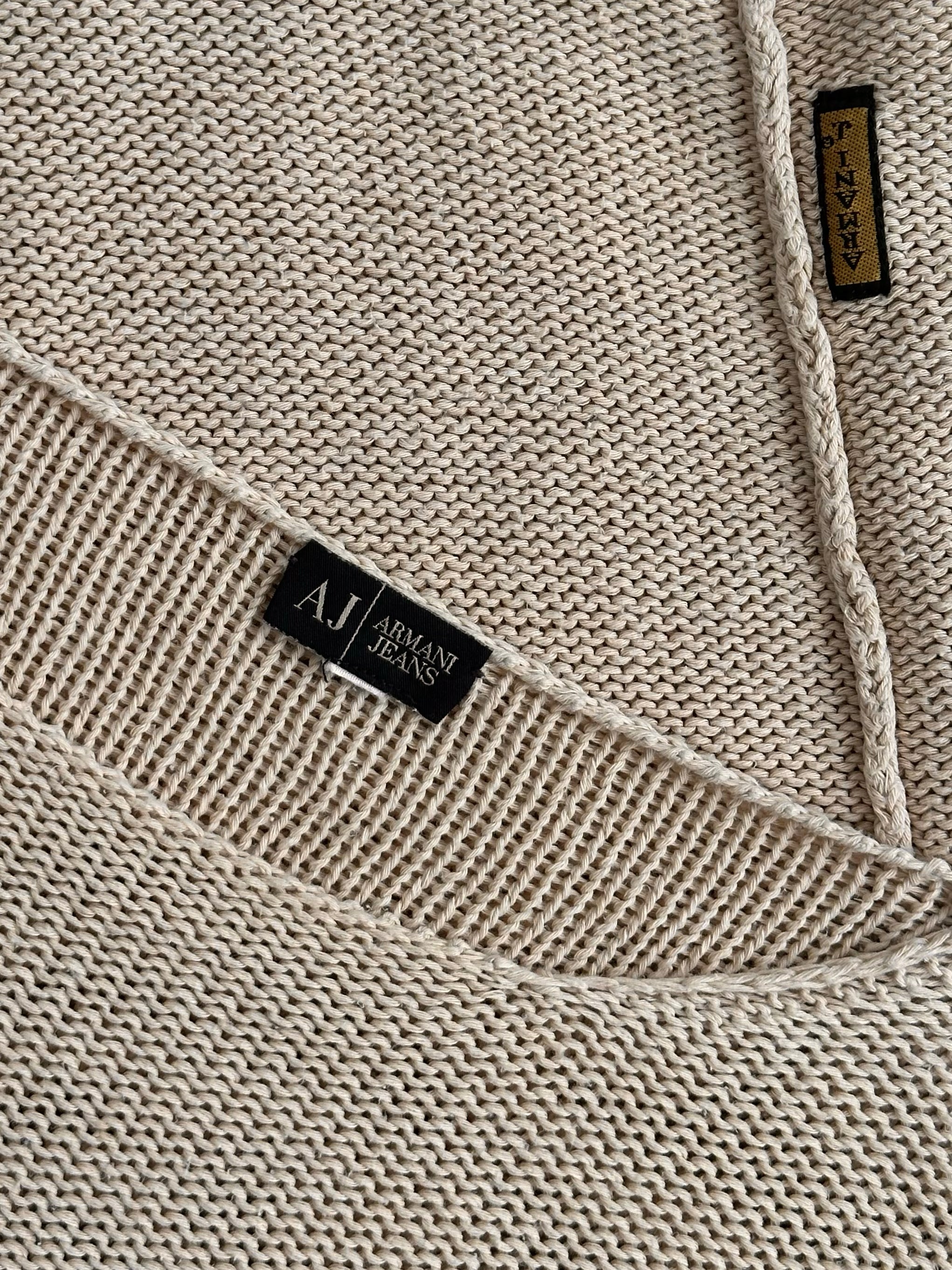 Armani Jeans 1990s pure cotton knit jumper in gray, displaying a close-up of the textured fabric and classic fit.