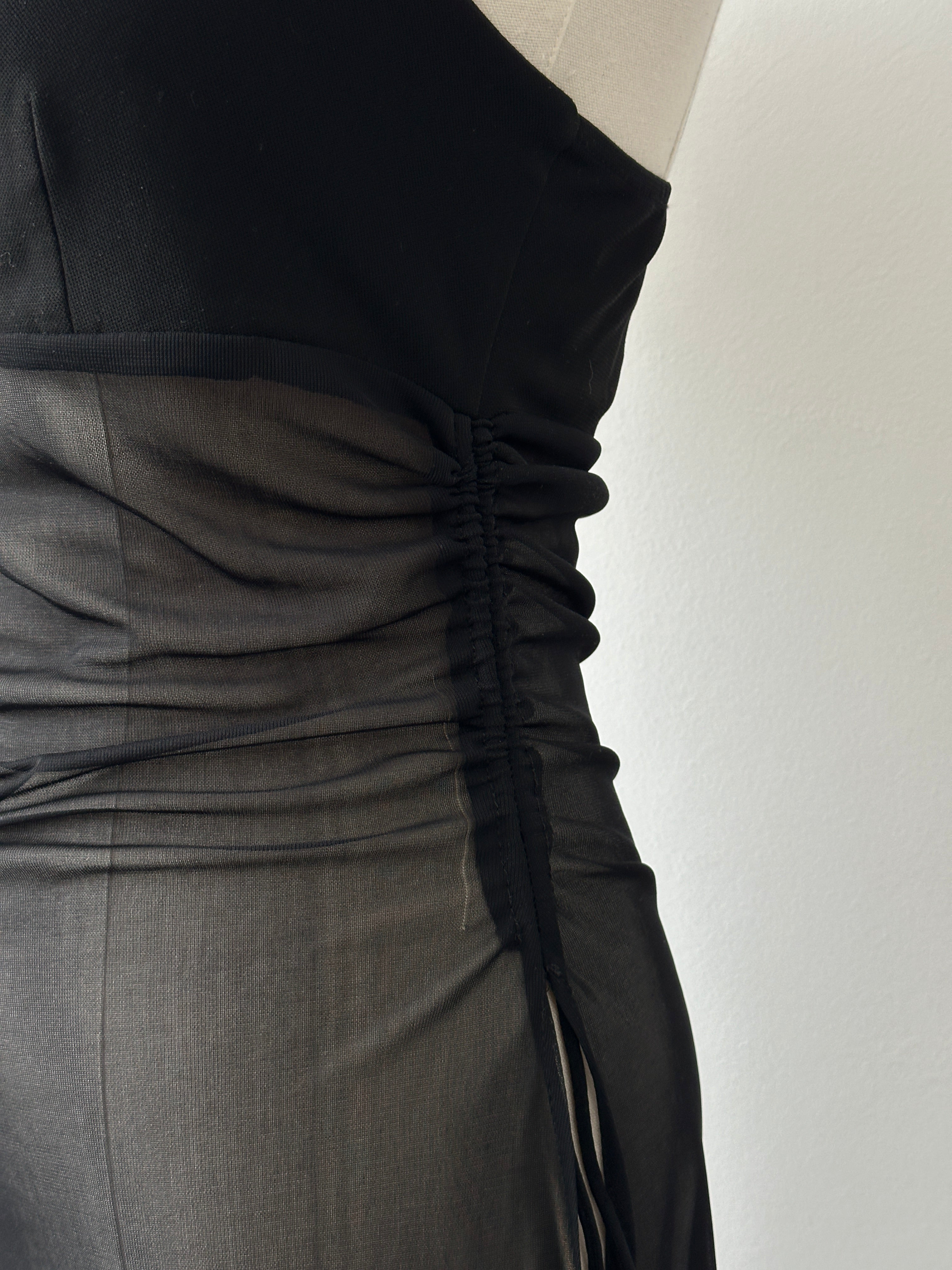 French vintage 1990s sheer sleeveless top by Vintage, showing lightweight fabric and classic sleeveless design.