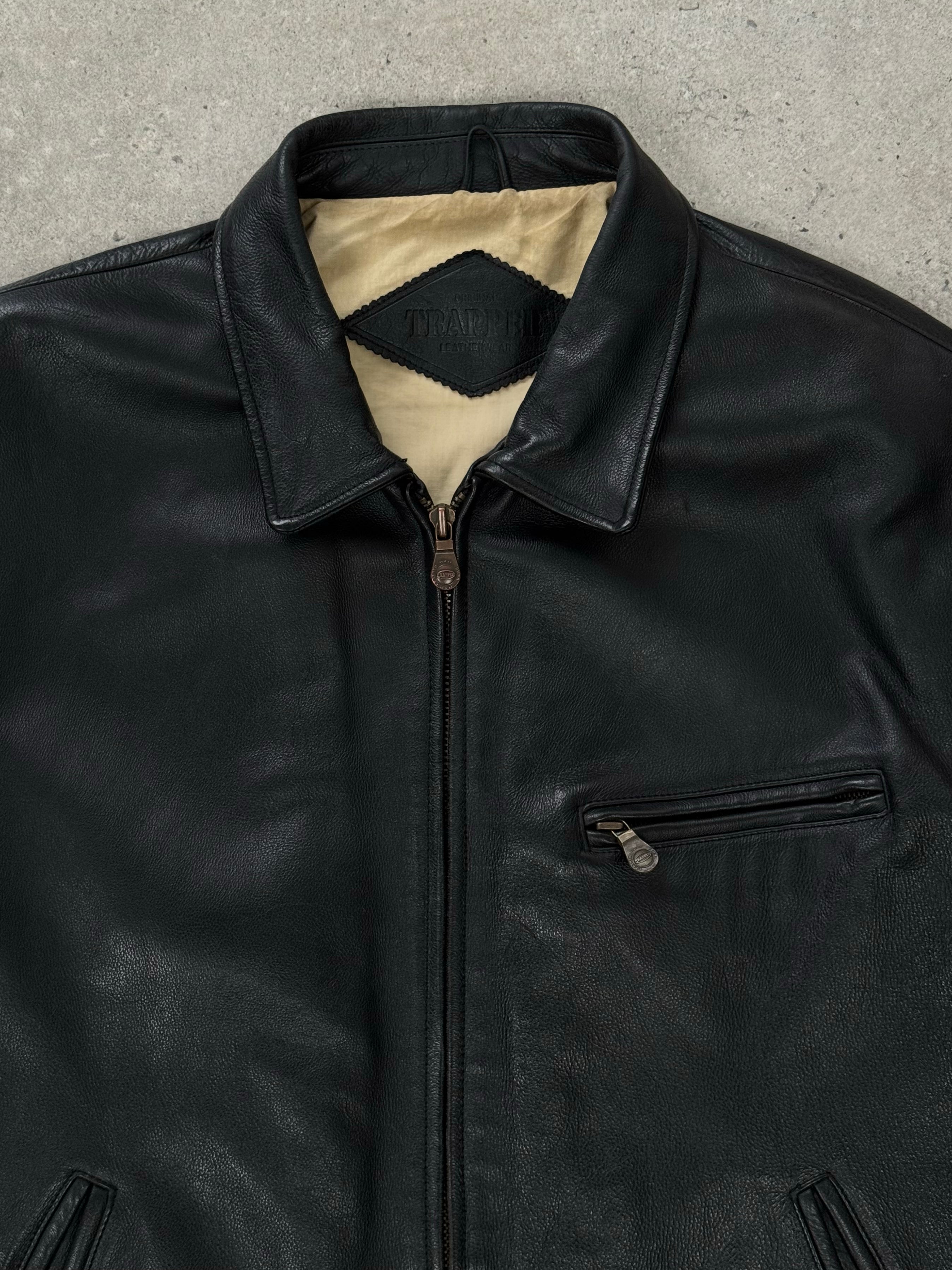 Vintage 1990s heavyweight leather jacket in XXL, minimal design, rugged leather texture, classic vintage style.
