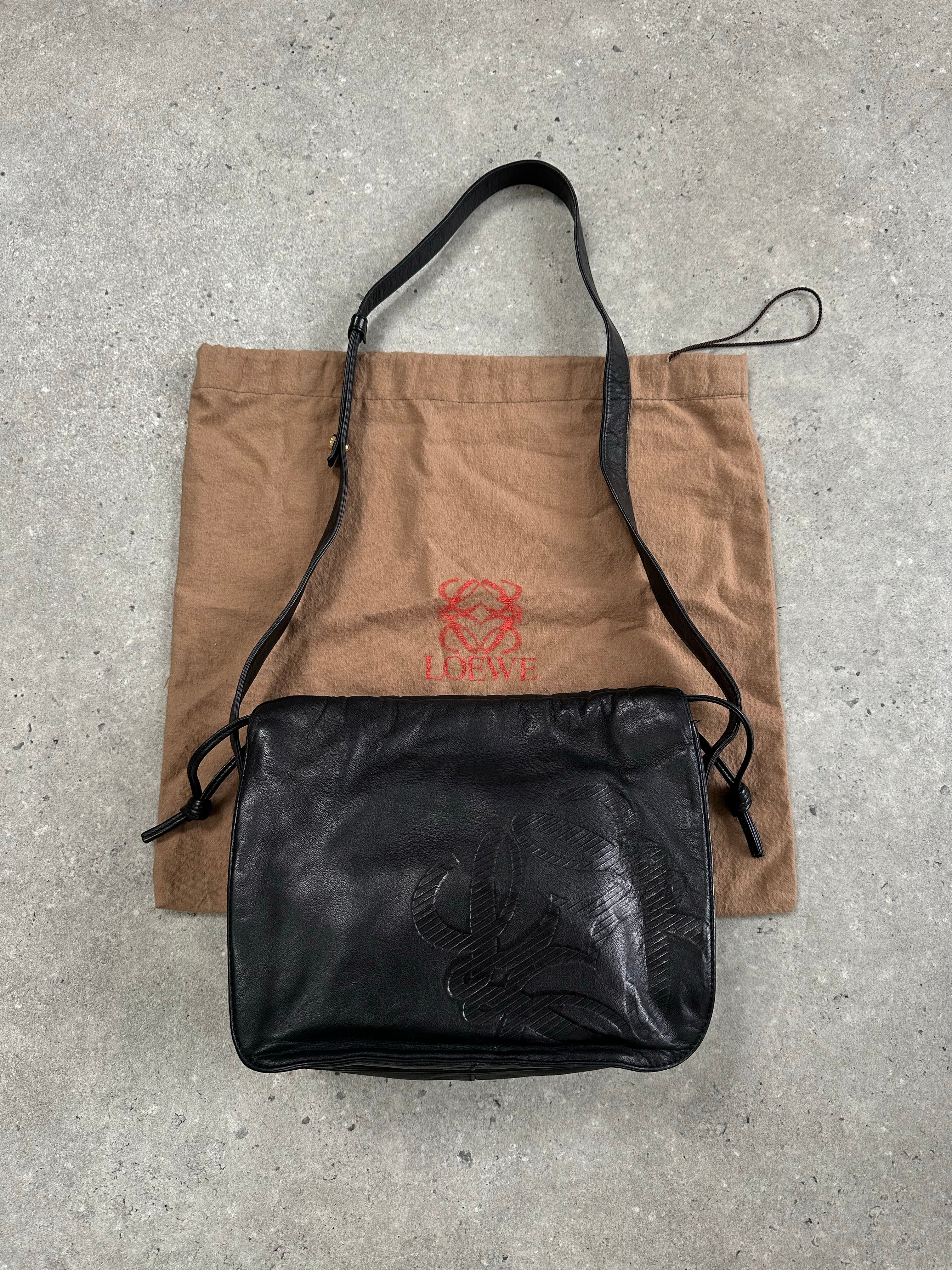 Loewe 1990s ruched leather Anagram crossbody bag with adjustable strap and signature logo detailing.
