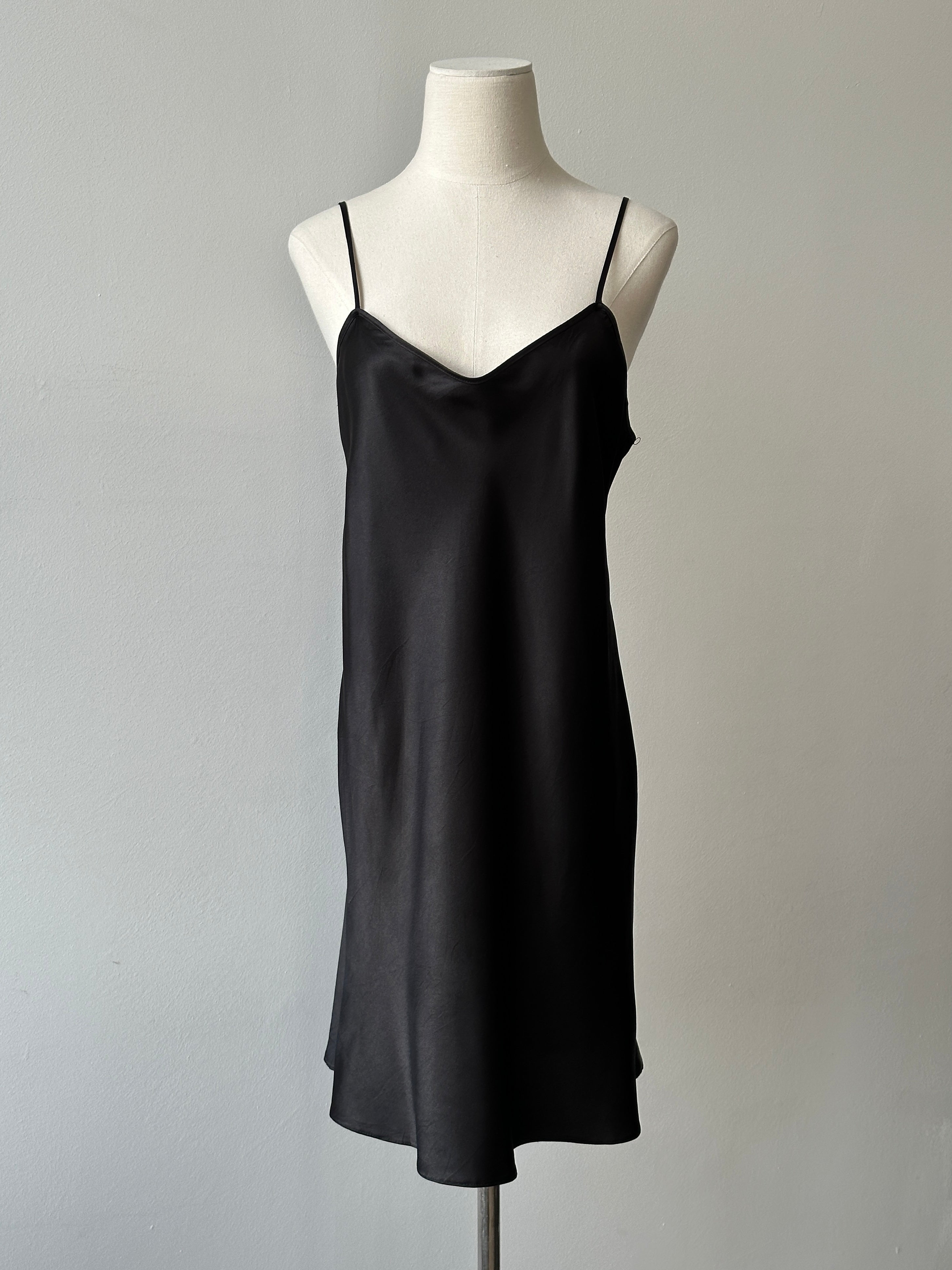 Vintage 1990s satin sleeveless dress, size M, with elegant design and smooth fabric, perfect for retro fashion style.