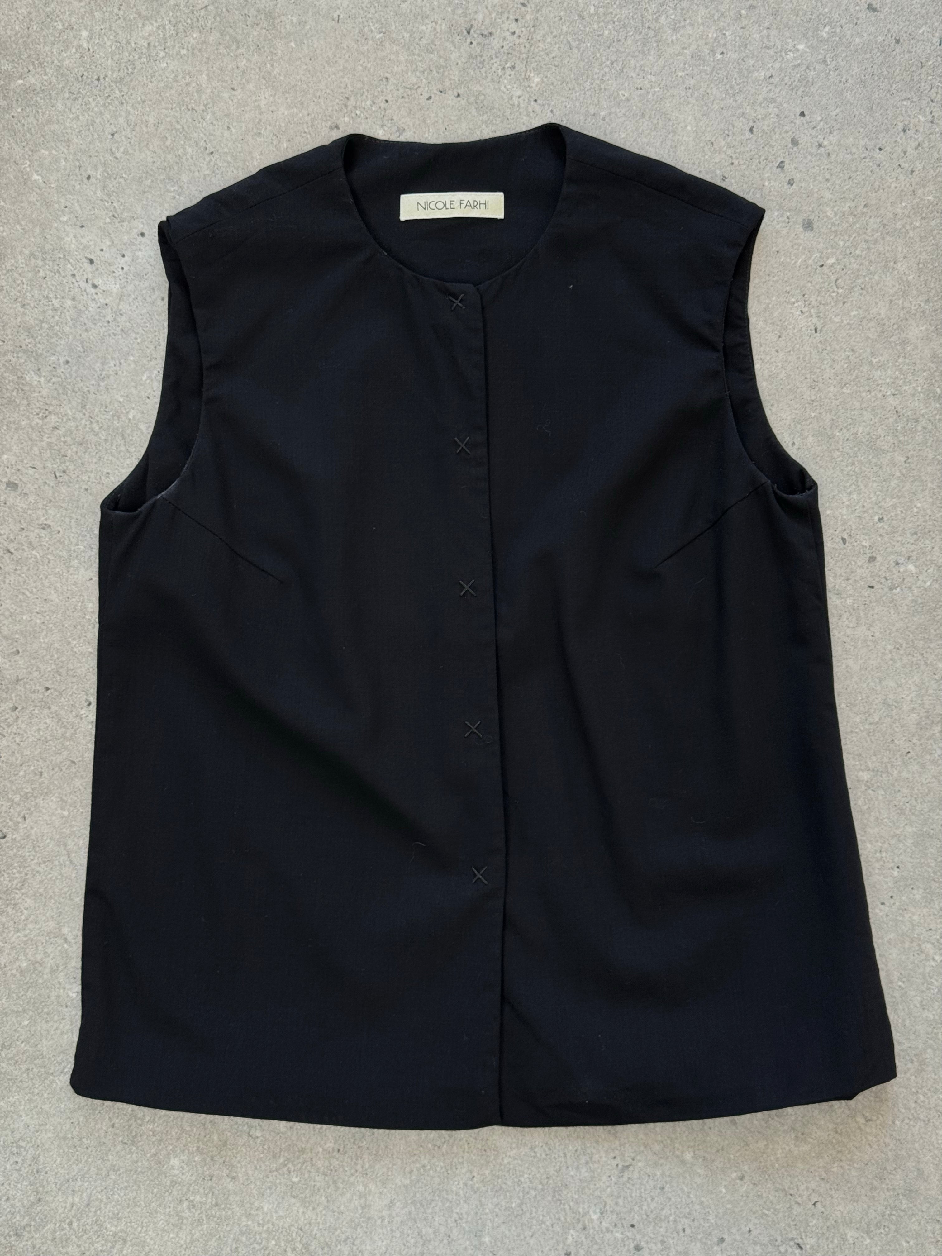 Nicole Farhi 1990s pure wool sleeveless top in XS, beige color, close-up of the sleeveless wool top with neckline details.