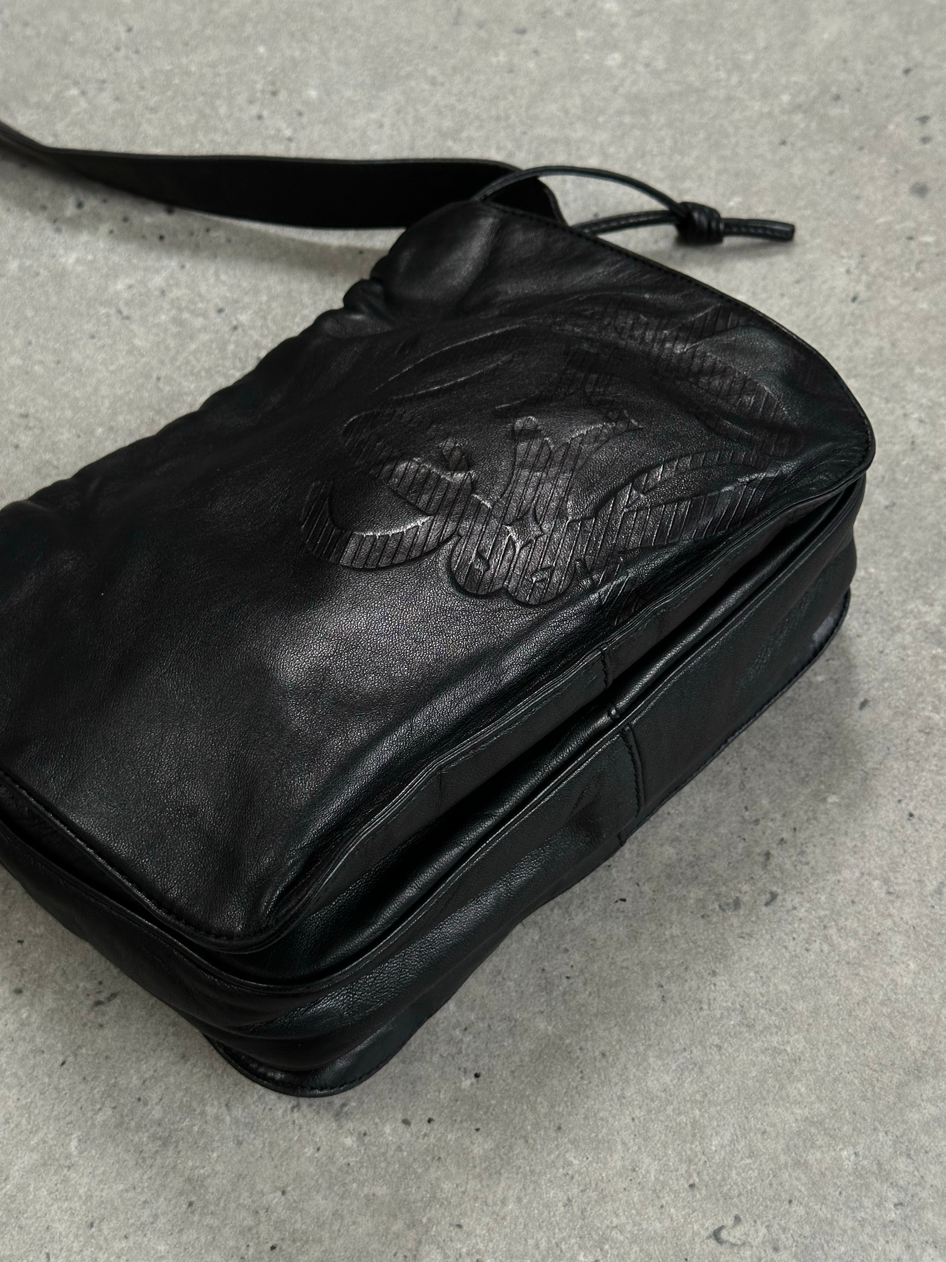 Loewe 1990s ruched leather Anagram crossbody bag with adjustable strap and signature logo detail.