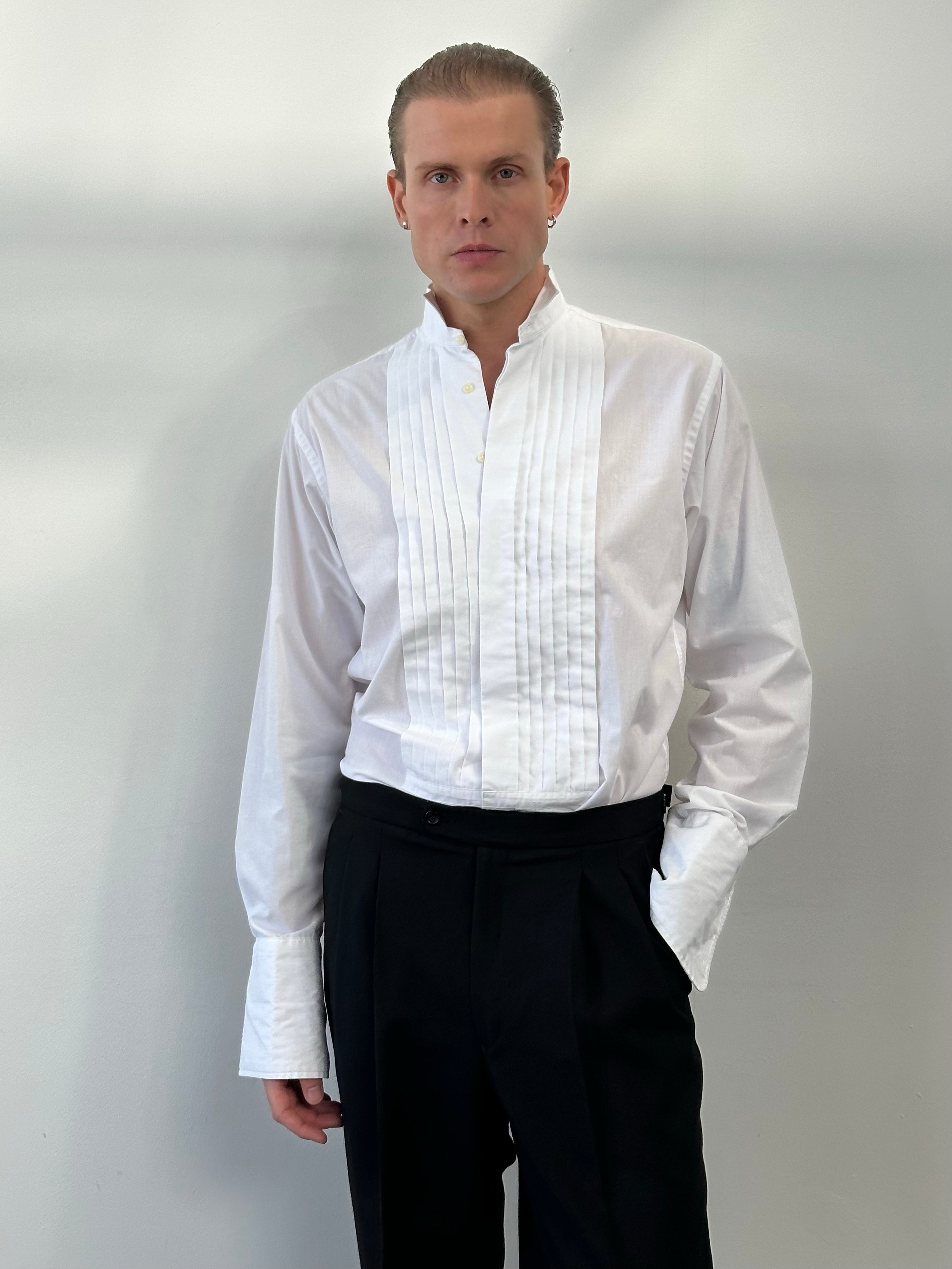 Yves Saint Laurent 1990s cotton tuxedo dress shirt, size M, featuring classic white fabric, pointed collar, and button-front design.