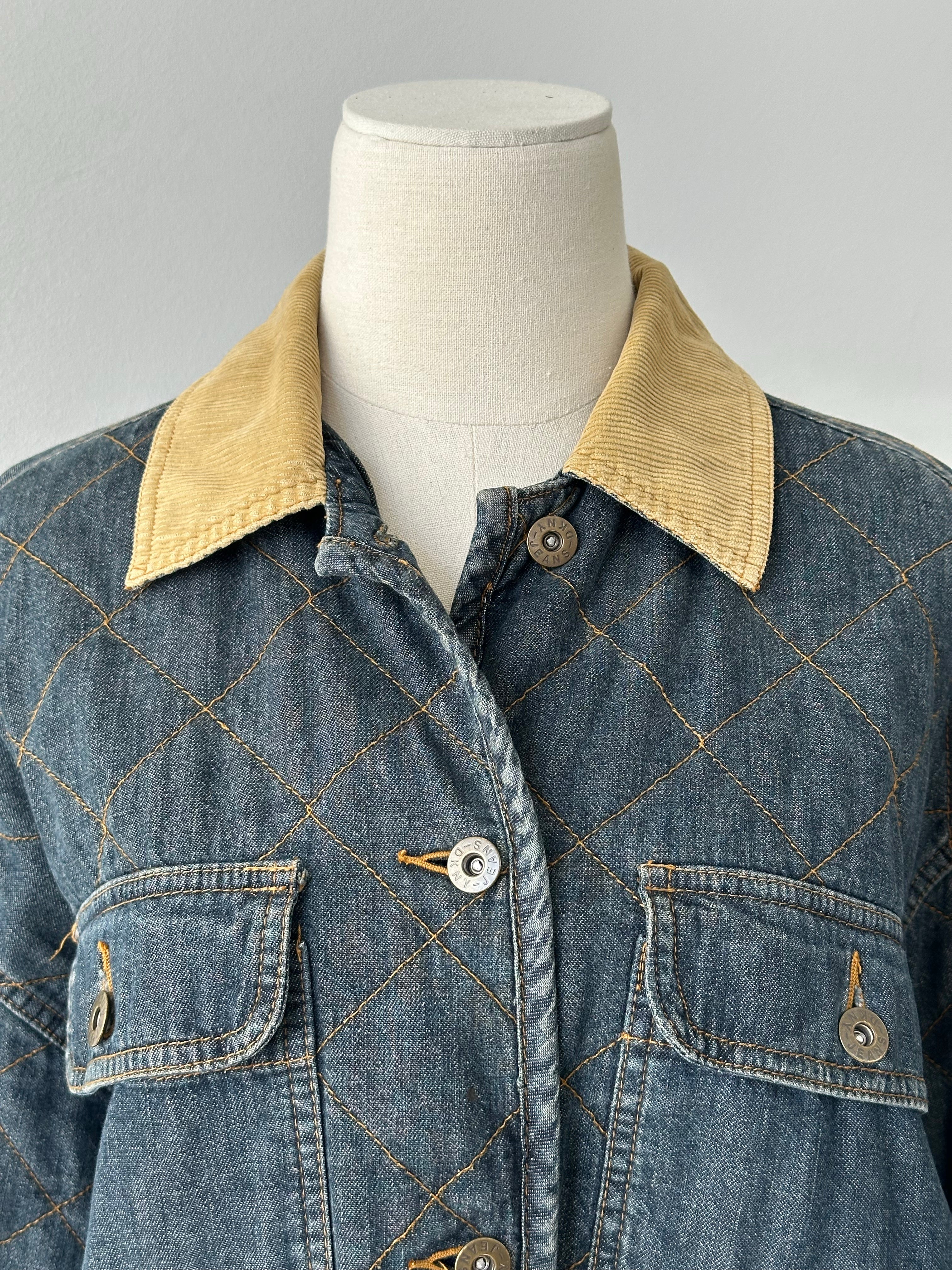 DKNY jeans 1990s pure cotton jacket in size L, shown in natural light, with classic collar, front pockets, and button closures.