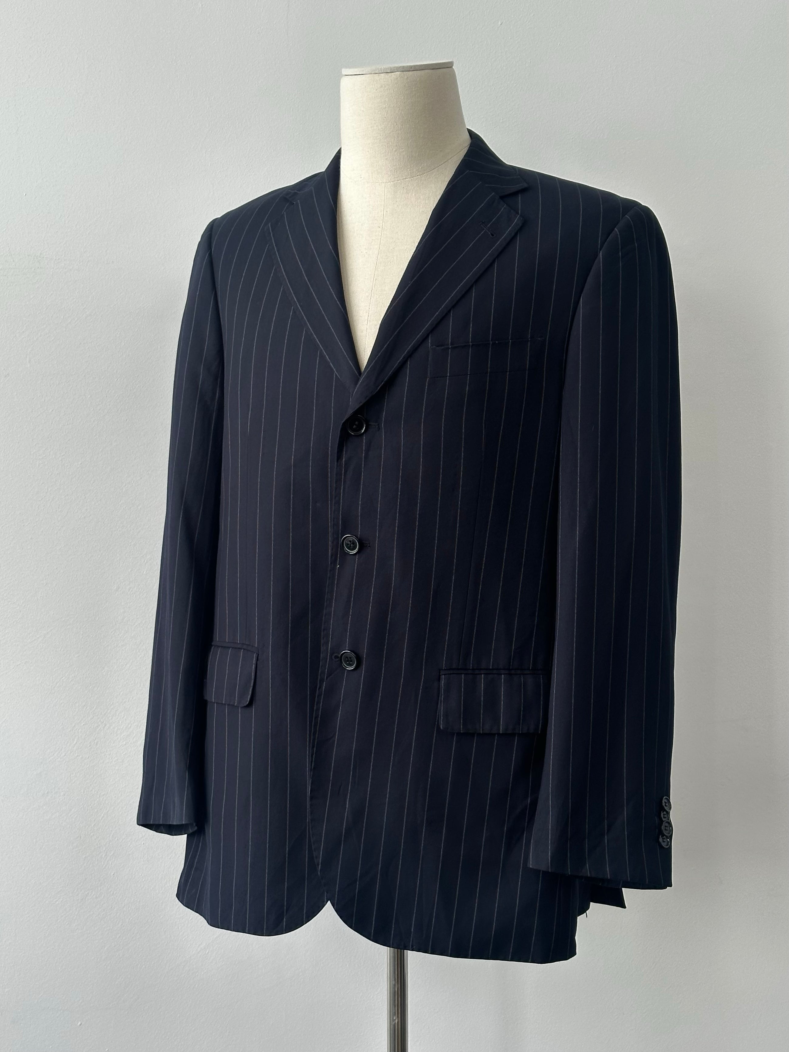 Loro Piana wool cashmere striped blazer in 1990s style, size 42R, featuring classic tailored fit and multicolor pattern.