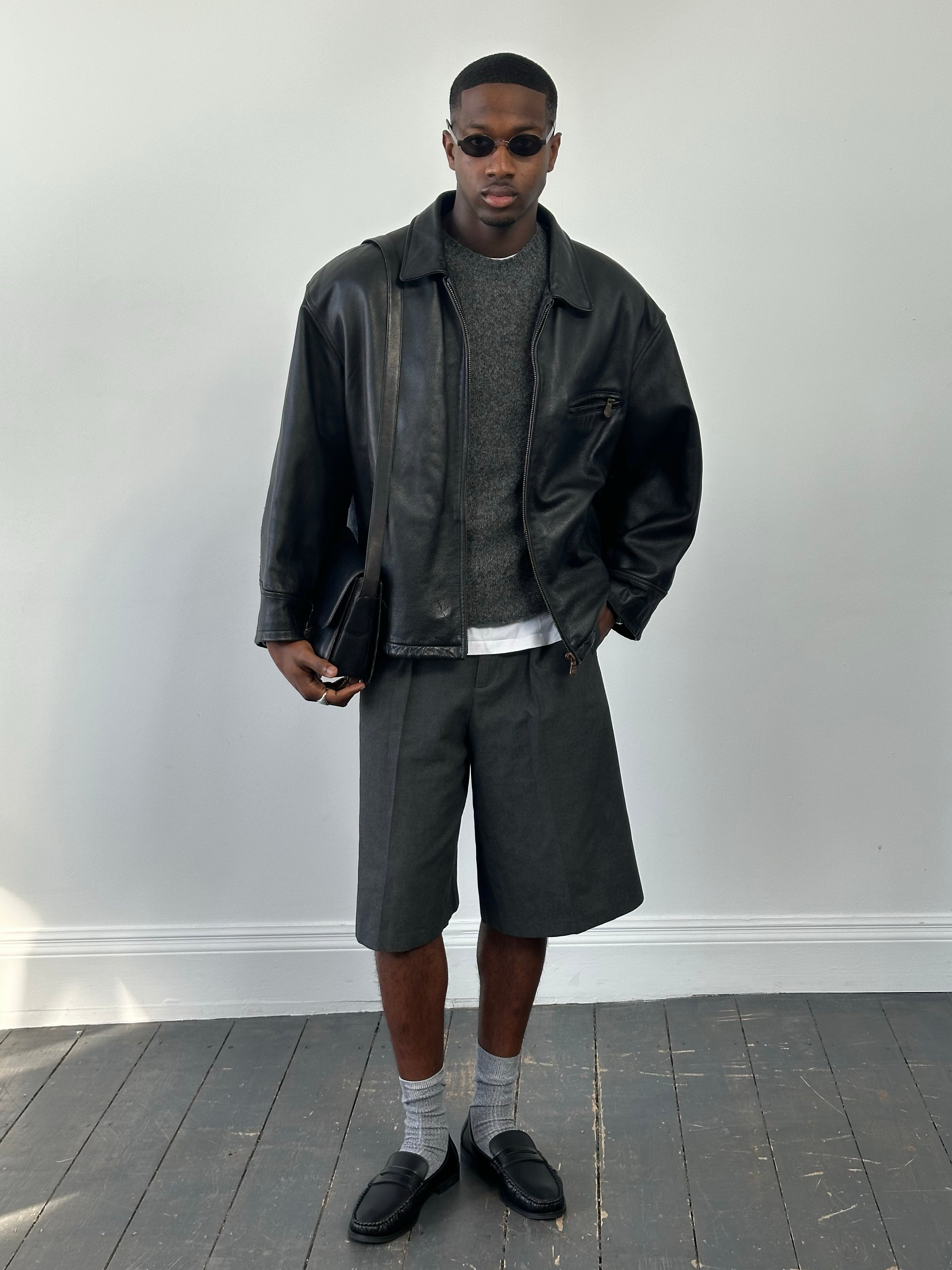 Vintage 1990s heavyweight leather jacket in black, minimal design, sized XXL, made by Vintage brand.