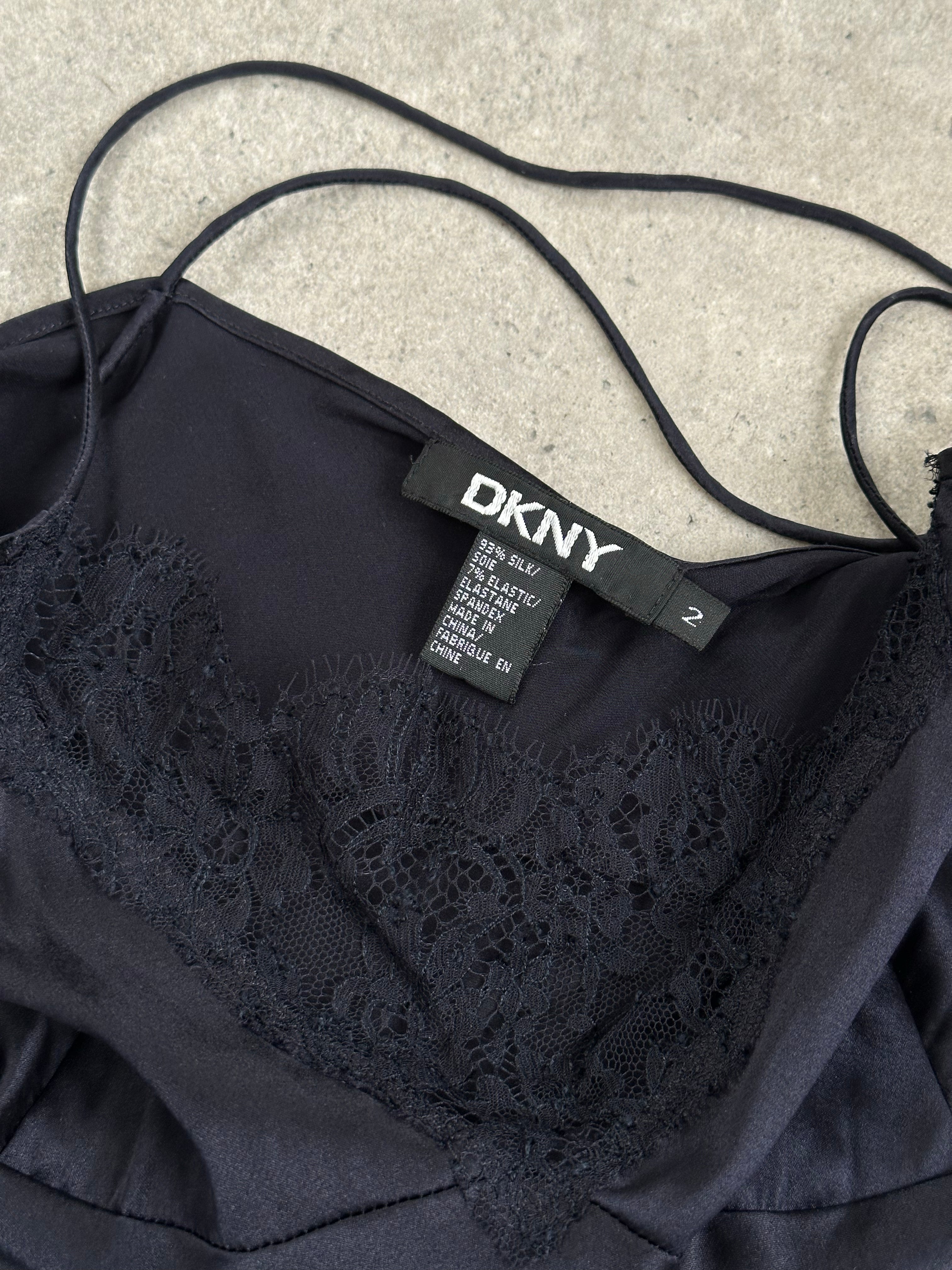 DKNY 2000s silk lace cami top in XS, featuring delicate lace details and a sleek, fitted design.