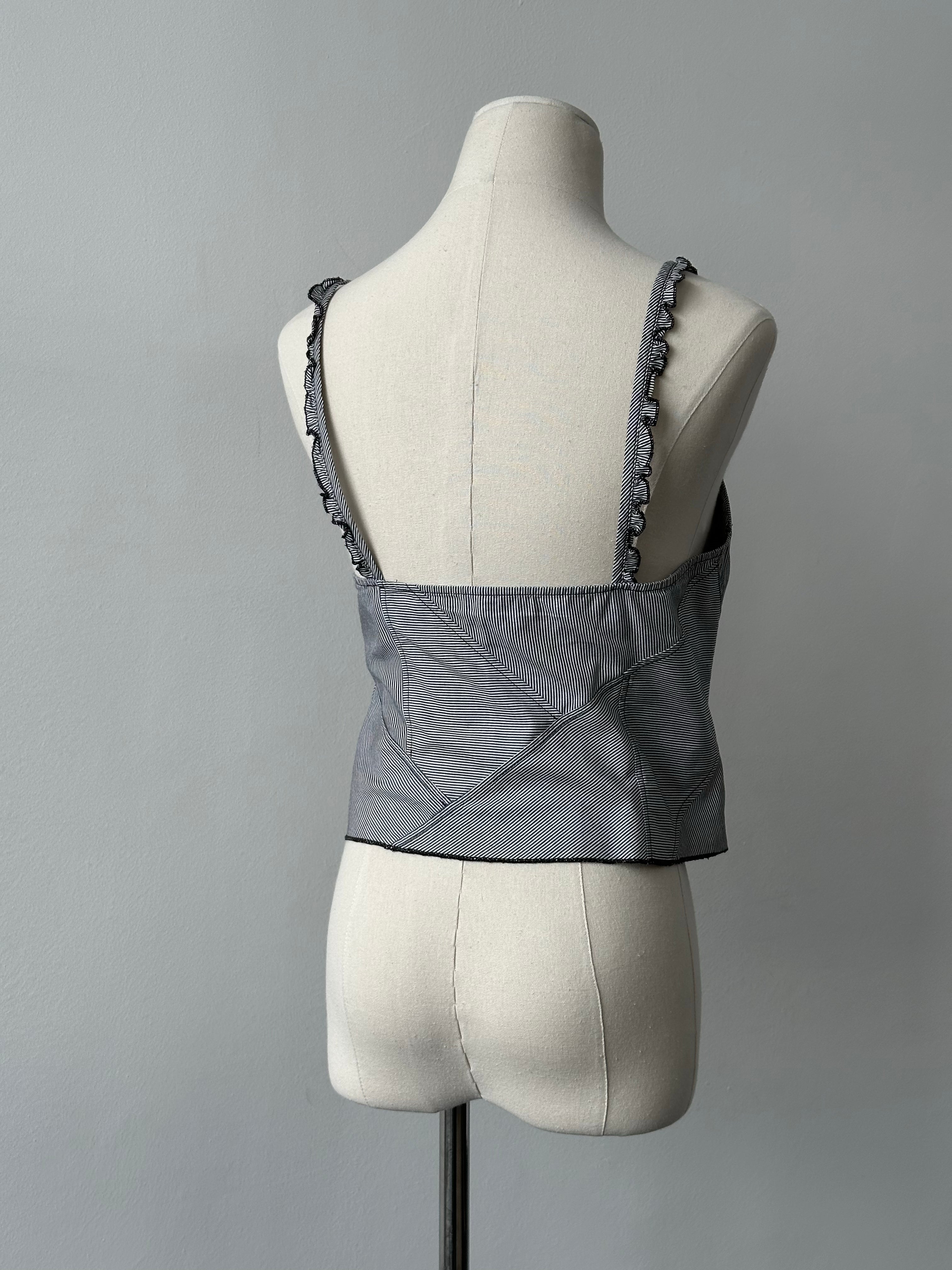Armani Jeans 1990s pure cotton top in S/M, featuring a casual short sleeve design and classic fit, on a hanger.