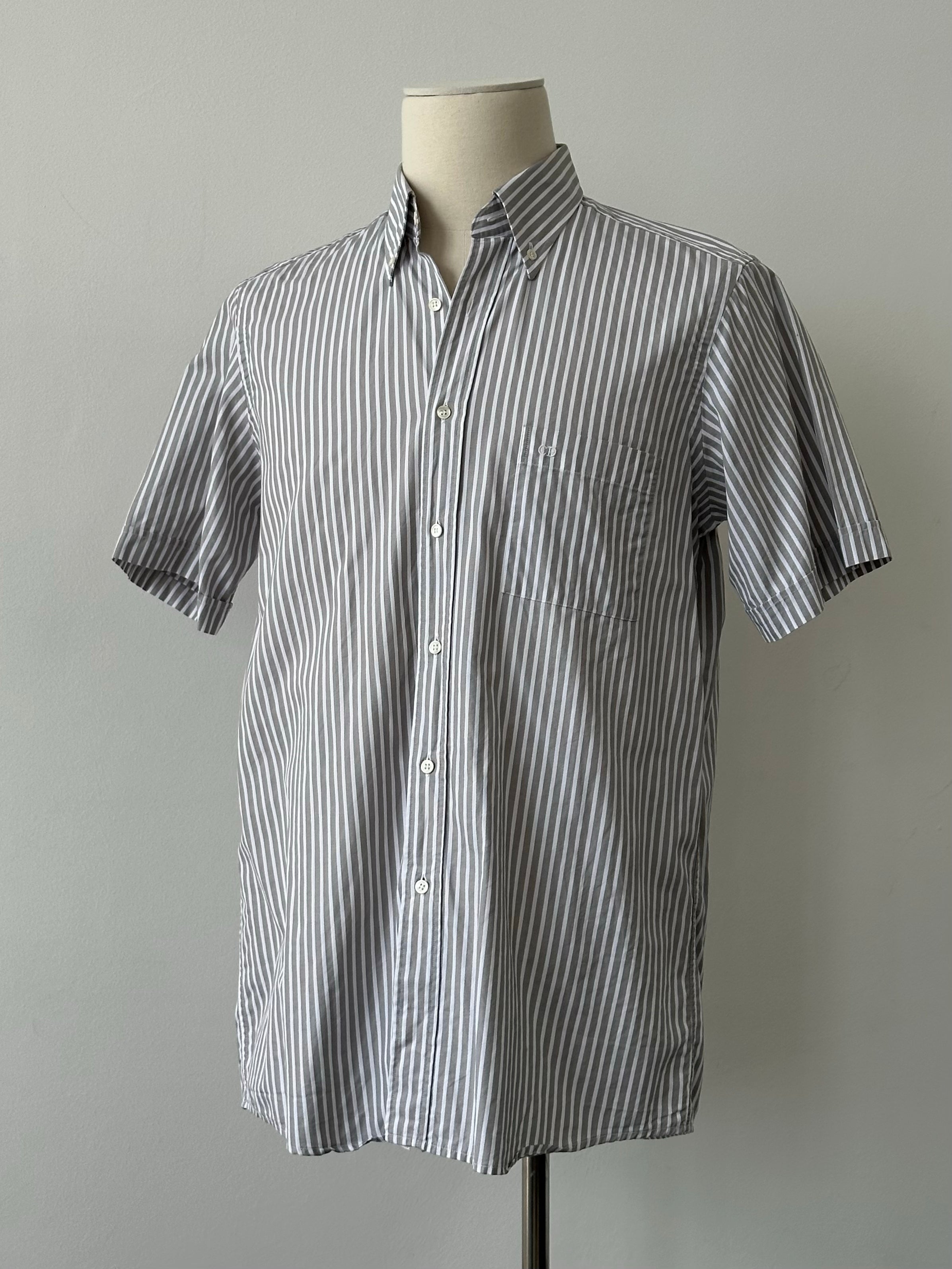 Christian Dior 1990s pure cotton striped short sleeve shirt in white and navy, displayed on a hanger.