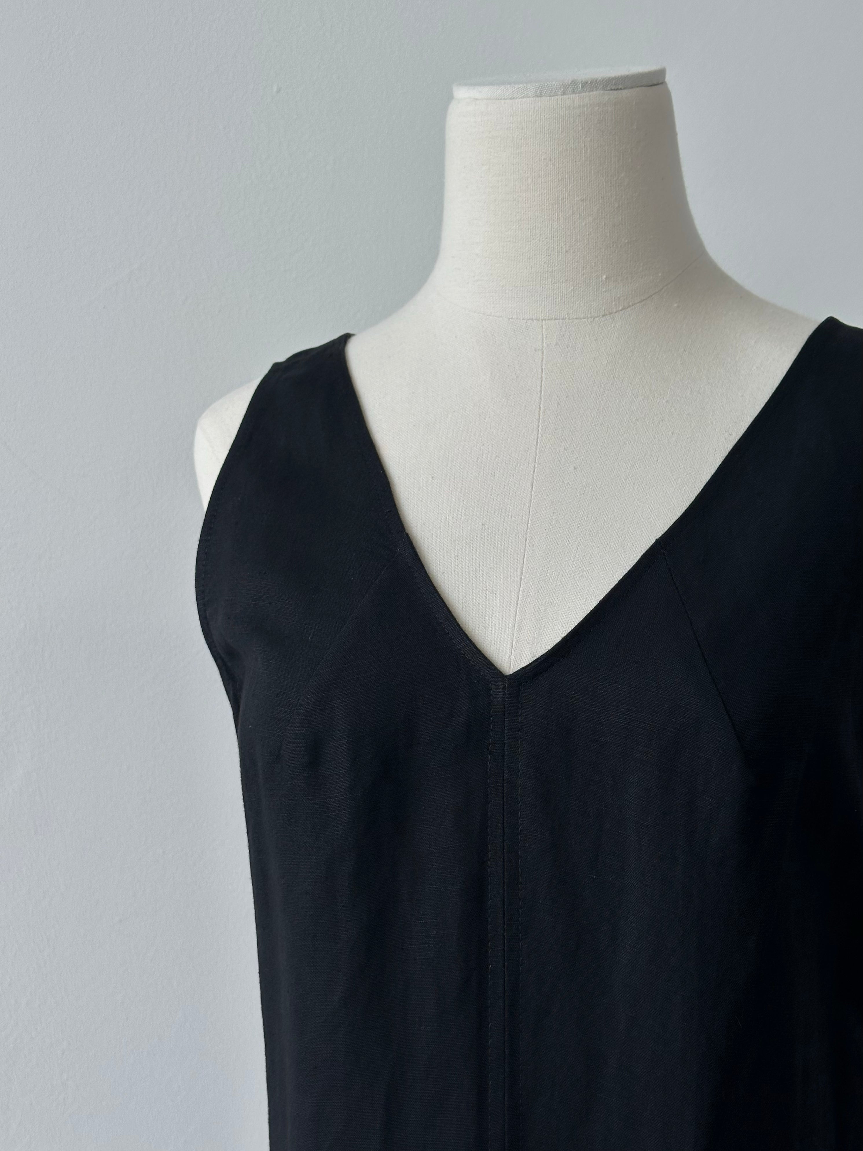 Marella 1990s linen V-neck floor-length dress in S/M with a relaxed fit, featuring a flowy silhouette and natural fabric texture.
