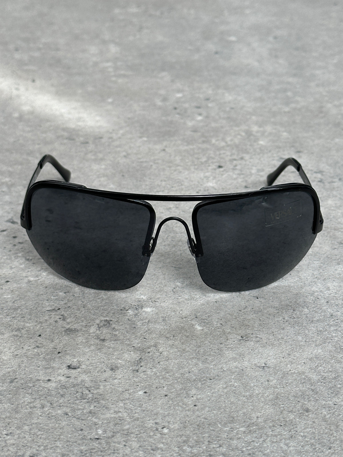 Versace 2000s Shield Aviator Logo Sunglasses with bold frames and signature gold accents, stylish and iconic eyewear.