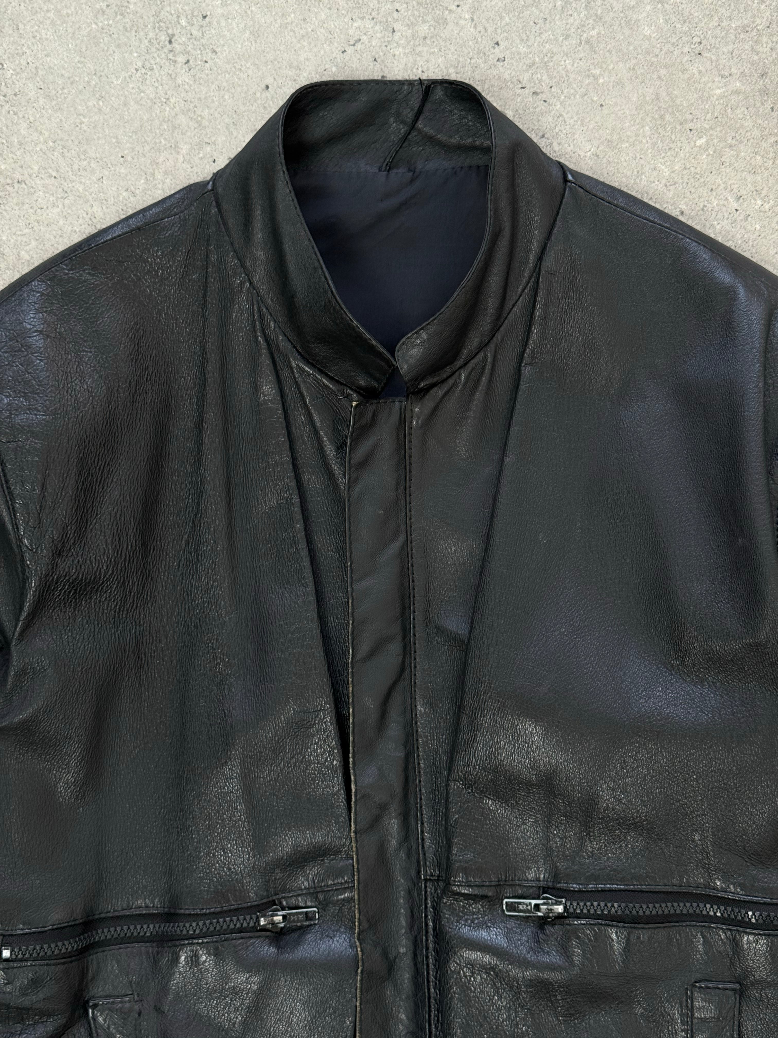 Vintage 1990s minimal leather jacket in size M, featuring sleek design and classic black leather from the Vintage brand.