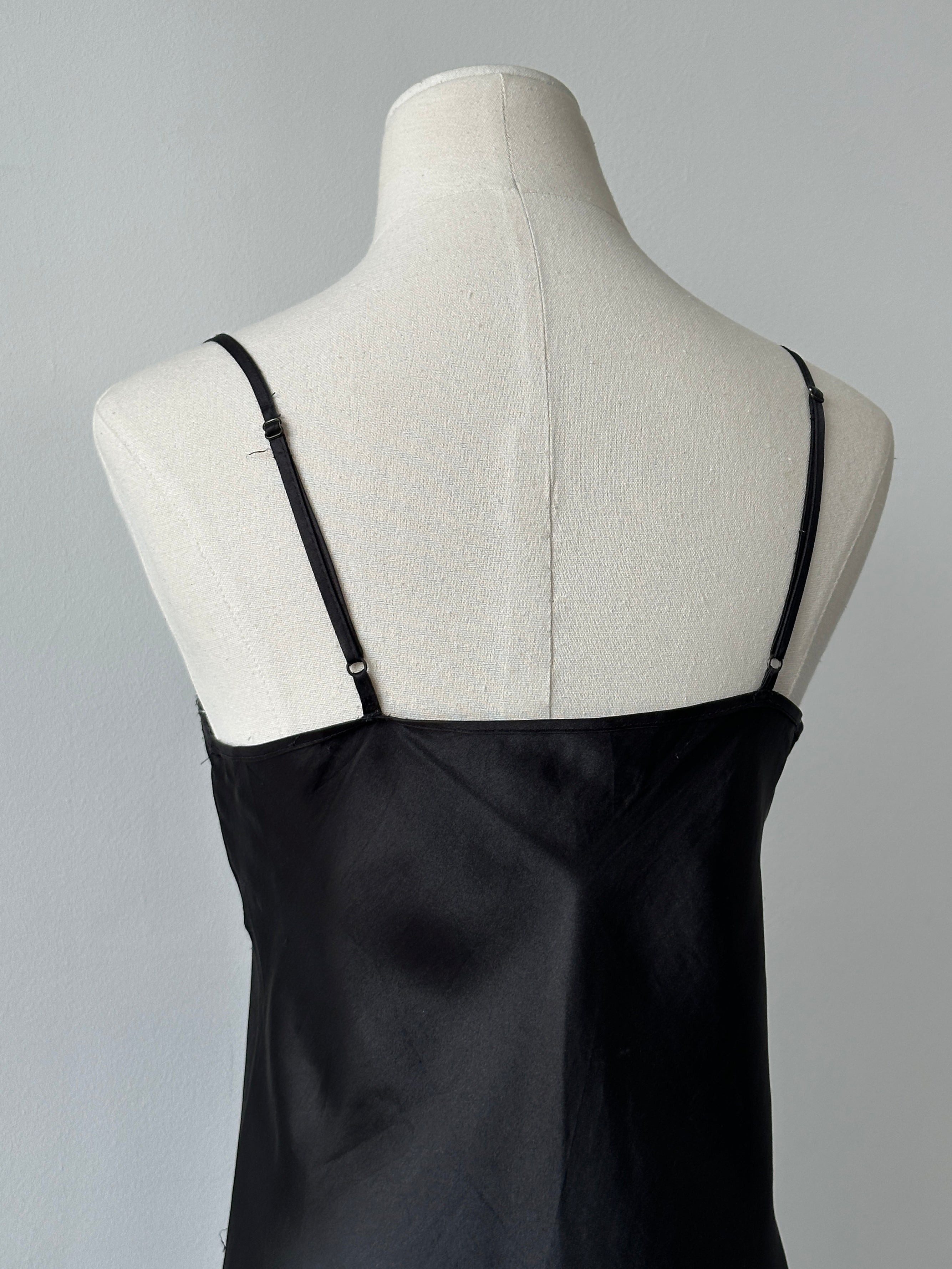 Vintage 1990s satin lace midi slip dress, size M, featuring elegant lace details and a smooth satin finish.