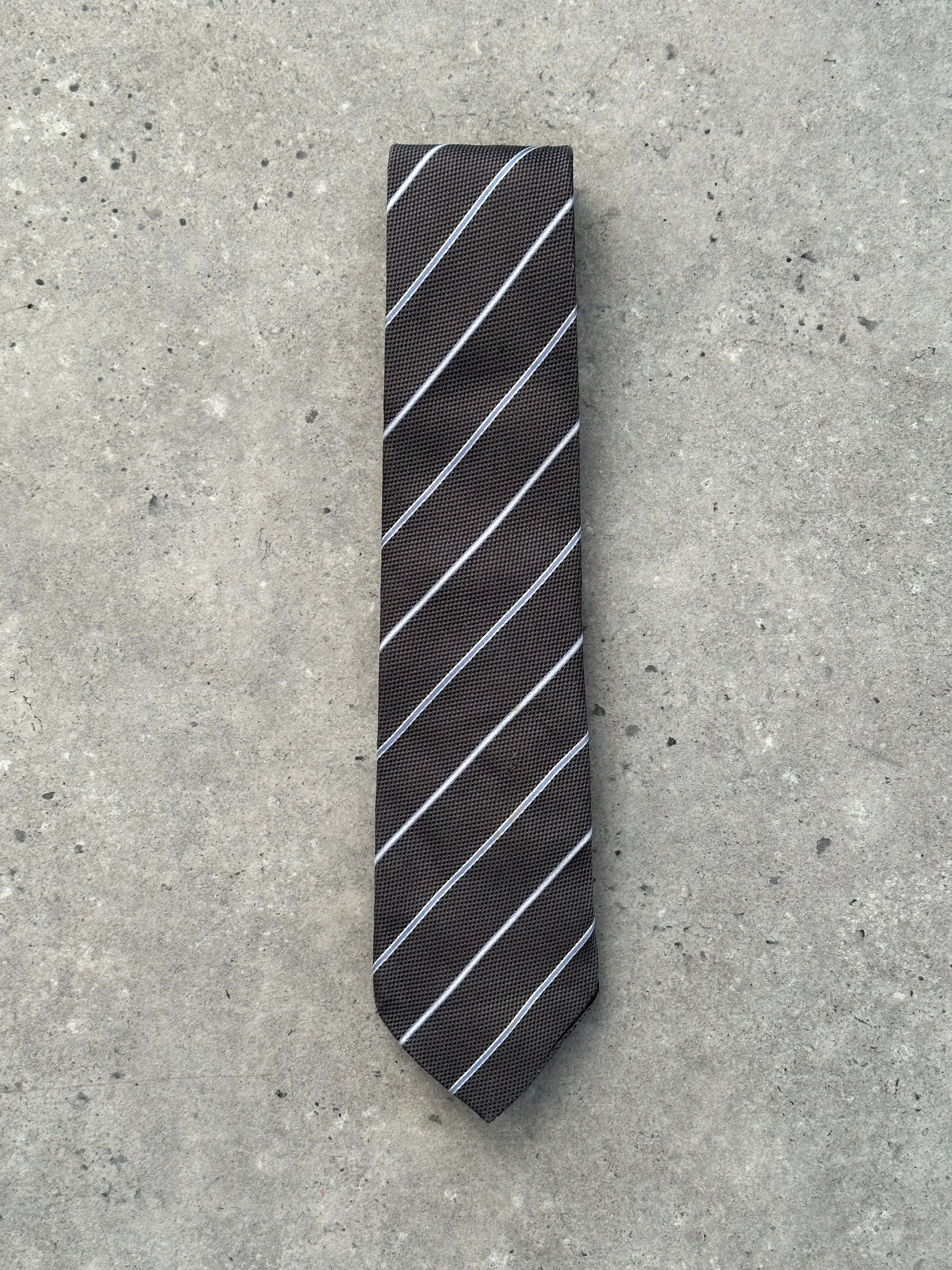 Burberry Black Label 2000s pure silk striped tie with classic design, featuring bold black and white pattern, stylish accessory for formal wear.
