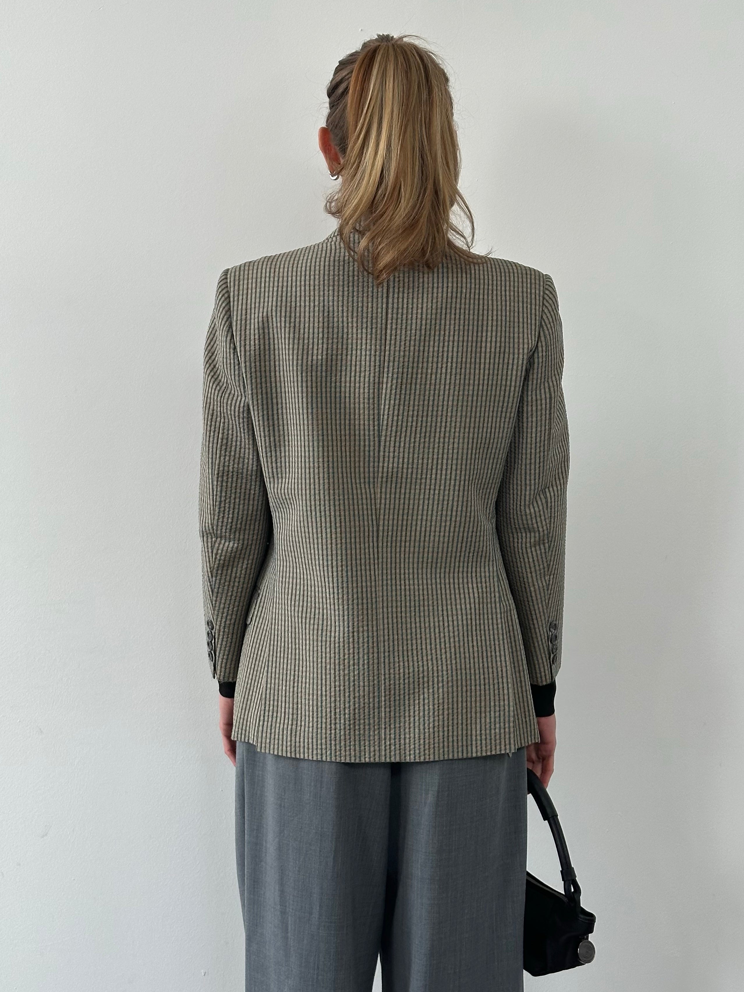 Burberry 1990s wool silk check blazer in unlined style, featuring classic plaid pattern and tailored fit.