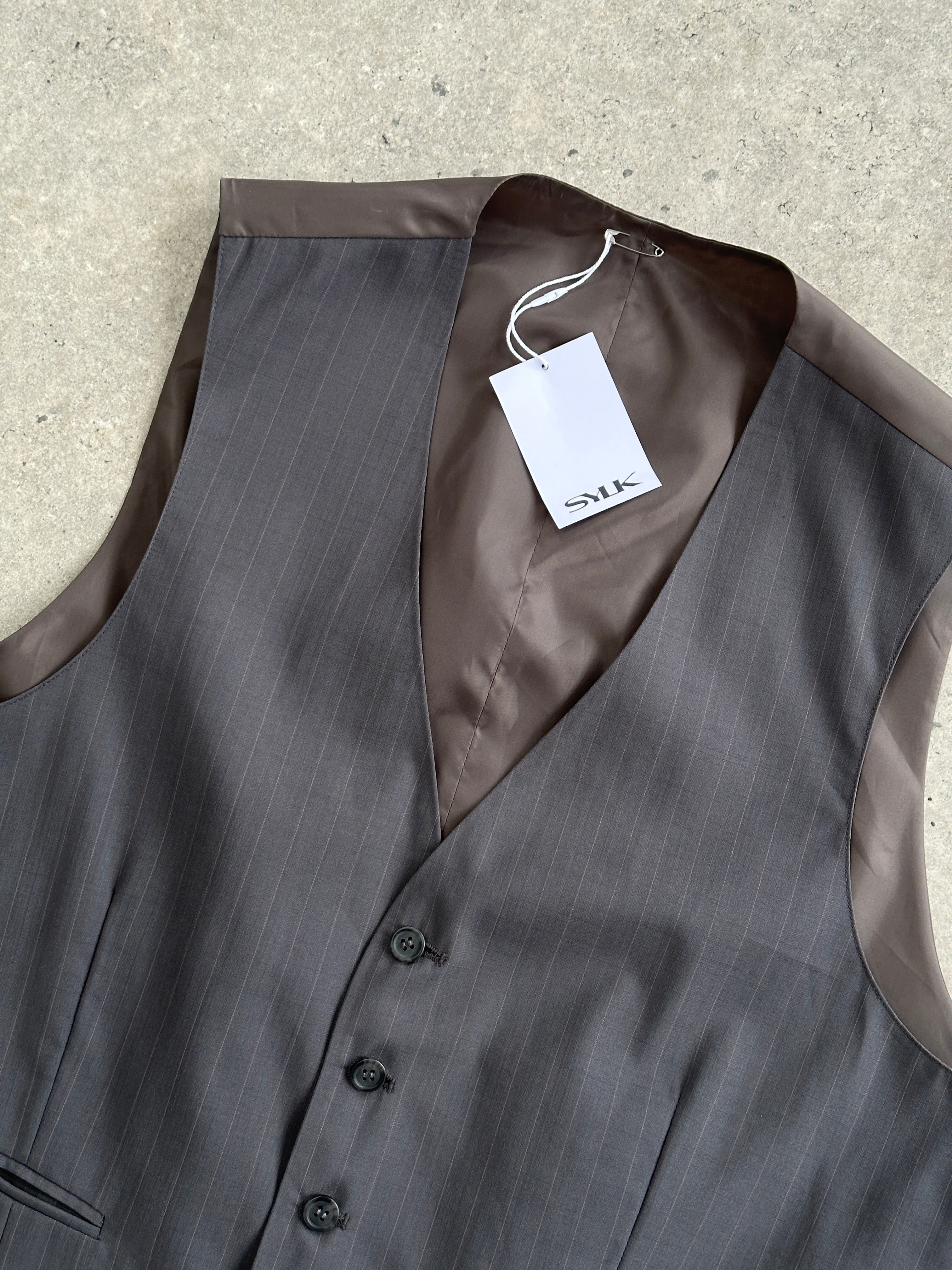 Vintage 1990s striped tailored waistcoat in size L, featuring classic pattern and structured fit, perfect for retro fashion.