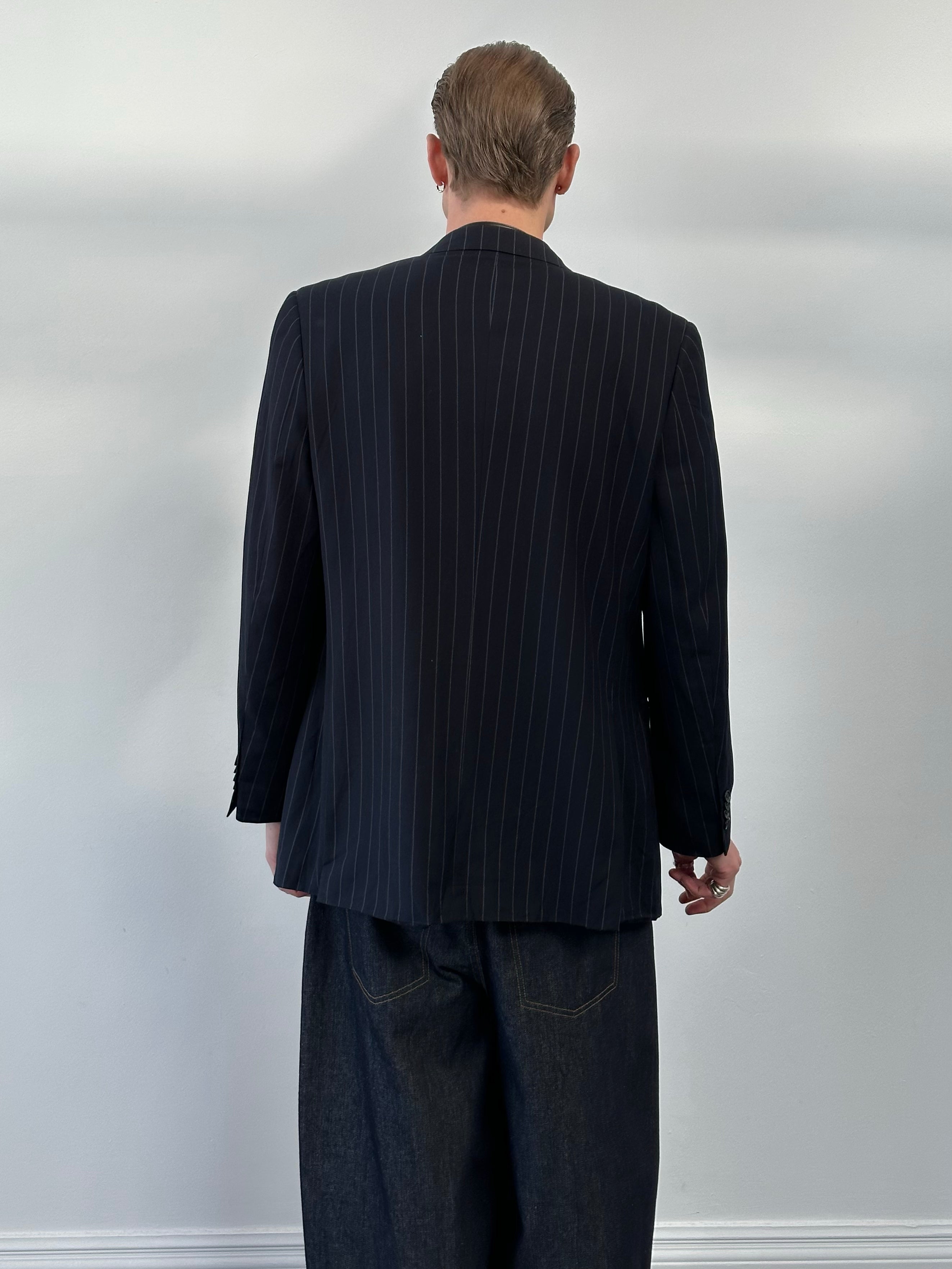 Loro Piana wool and cashmere striped blazer in 42R size, 1990s design, with classic tailored fit and multicolor pattern.