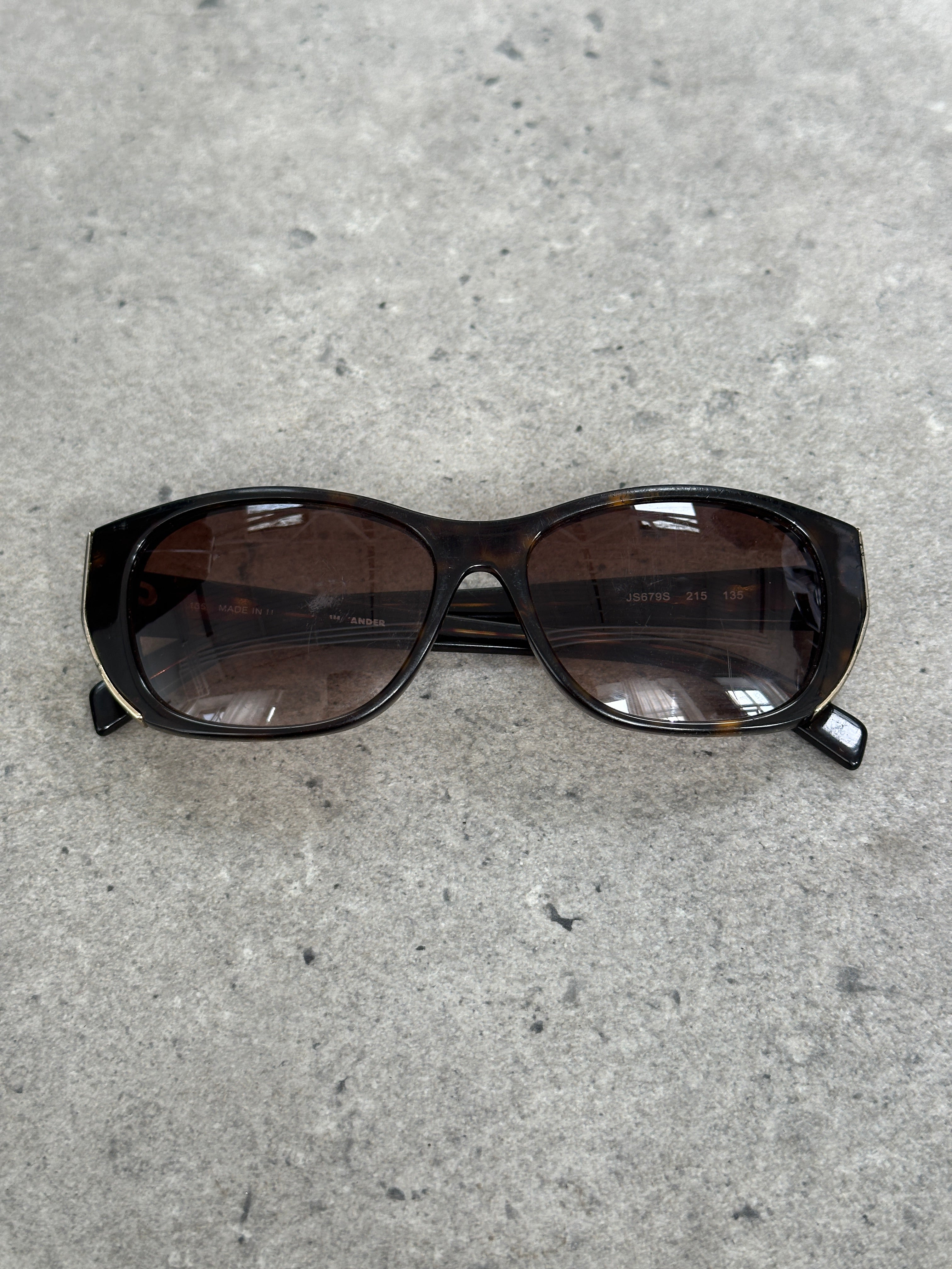 Jil Sander 2000s tortoiseshell rectangular logo sunglasses with bold frames and dark lenses.