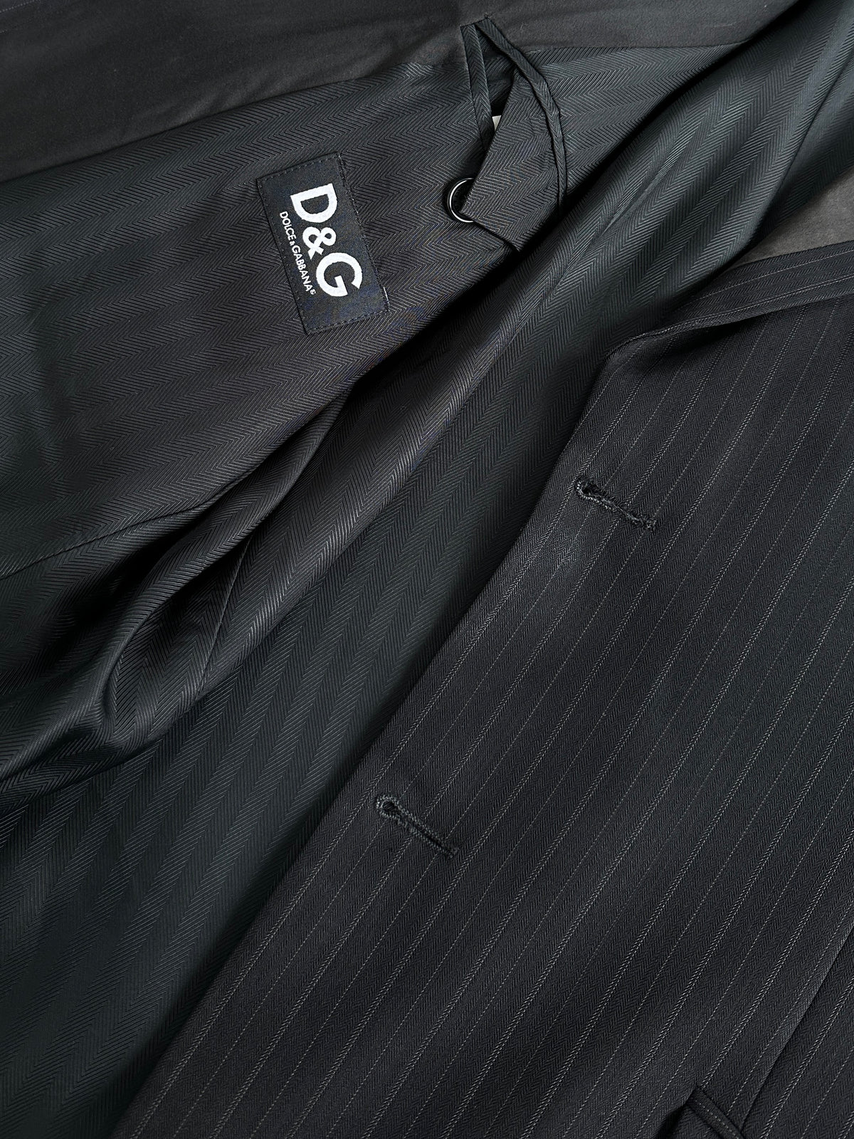 Dolce & Gabbana 1990s pure wool stripe tuxedo blazer in size L, black and white tailored blazer with notch lapels and button closure.