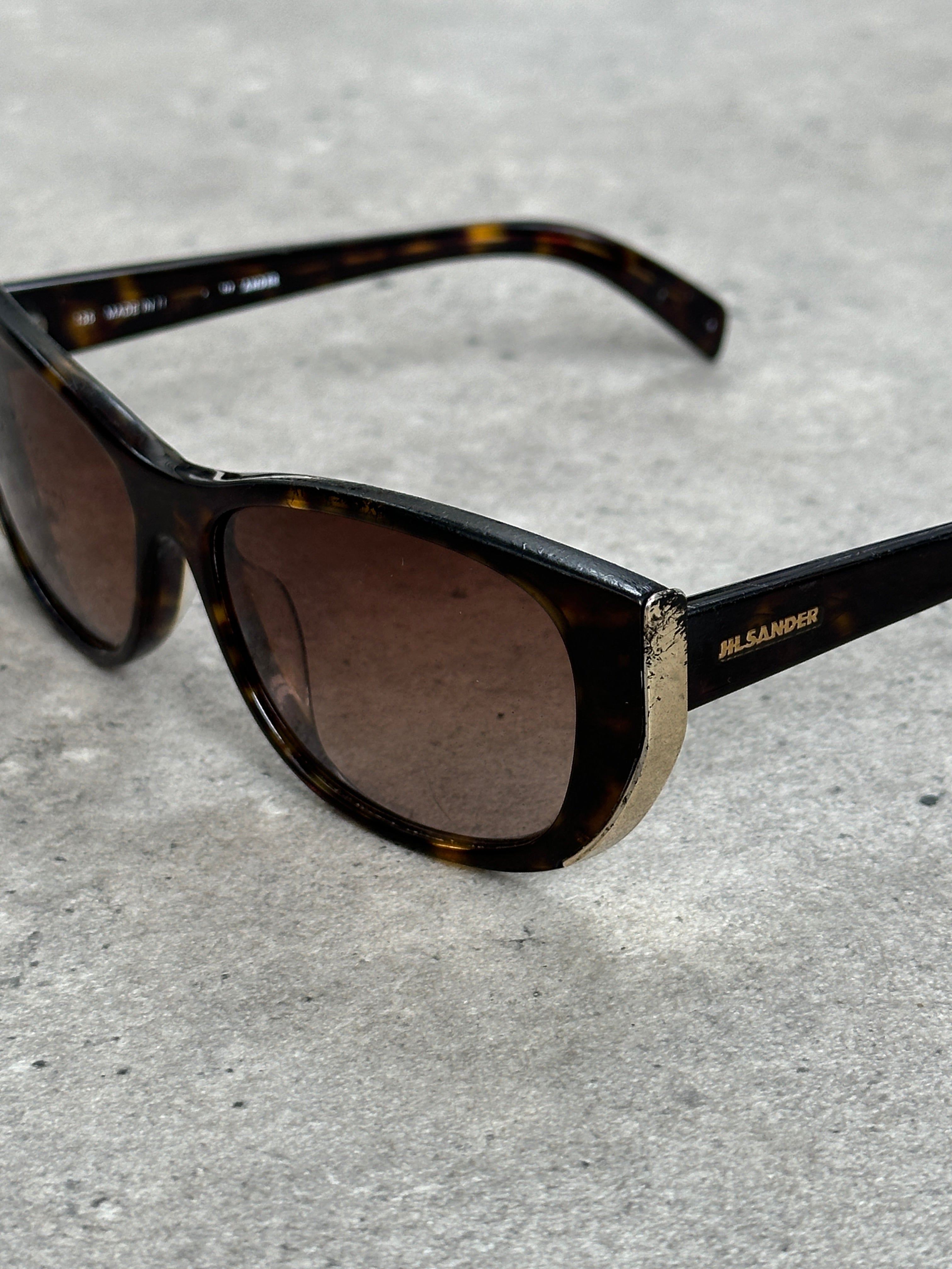 Jil Sander 2000s tortoiseshell rectangular logo sunglasses with dark lenses and sleek design.