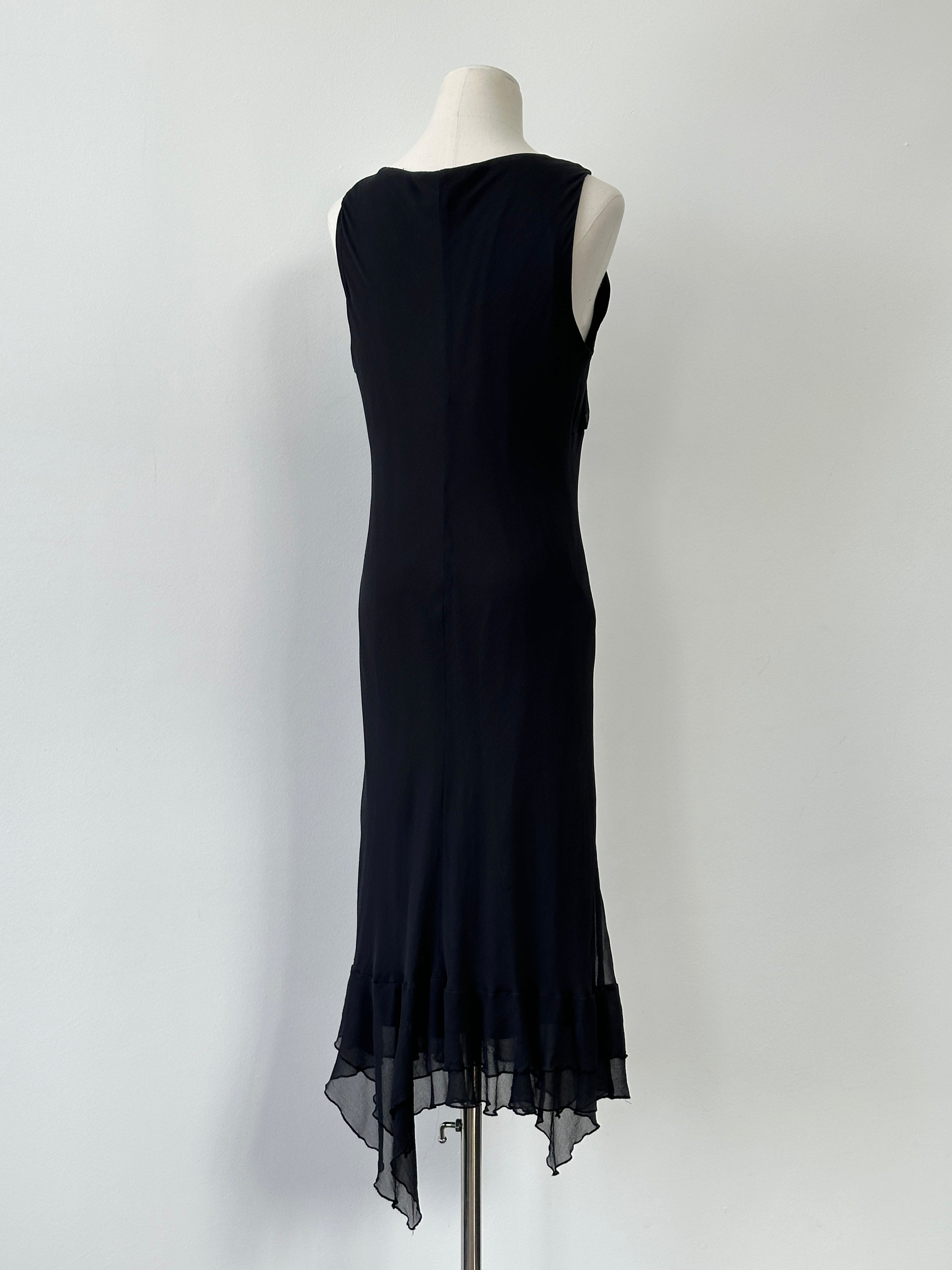 Vintage 2000s pure silk midi maxi dress with handkerchief hem, showcasing flowing fabric and elegant silhouette.