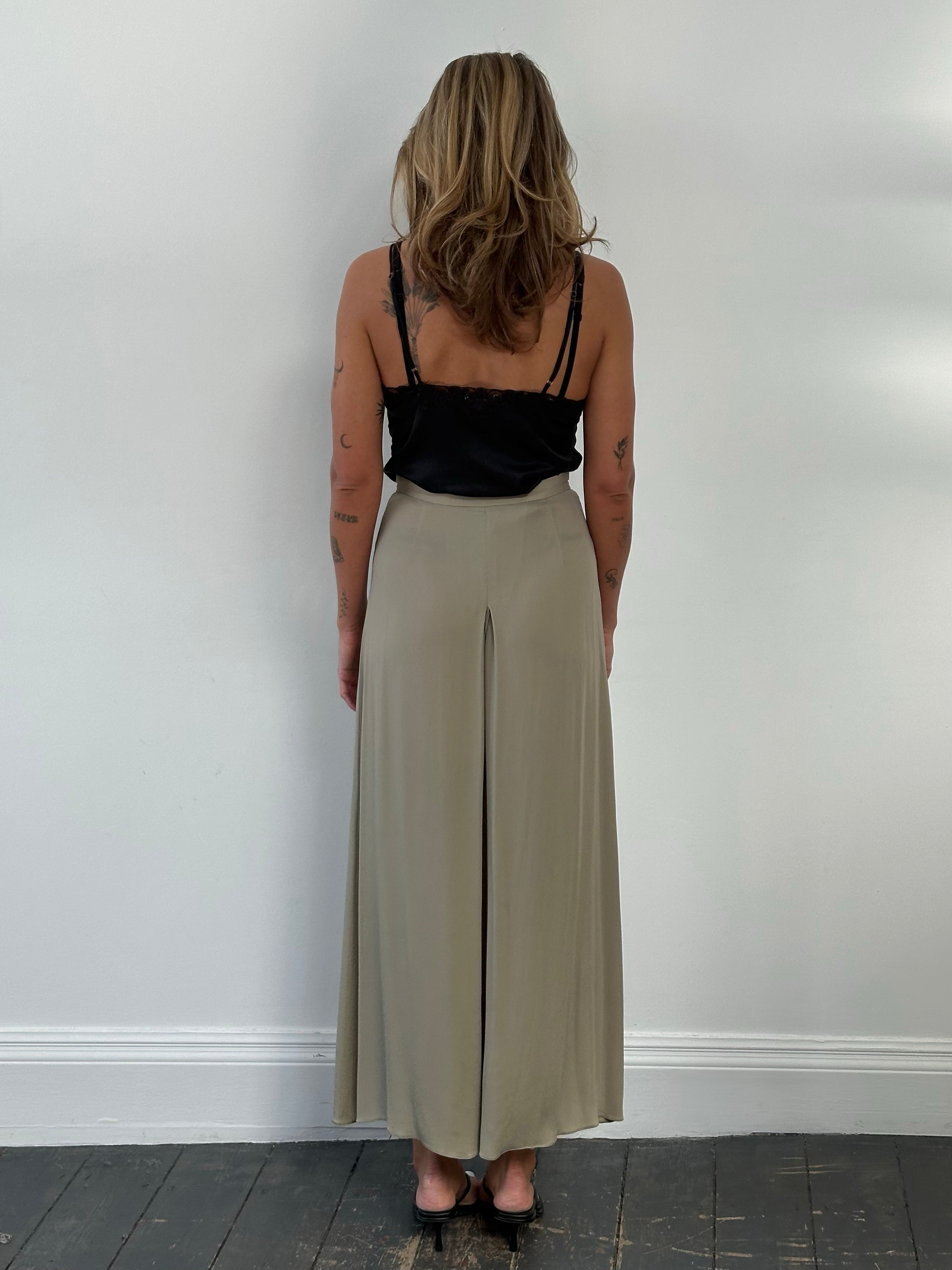 Armani Collezioni 2000s silk wide-leg pleated trousers in size W26, featuring a high waist and flowing fabric.