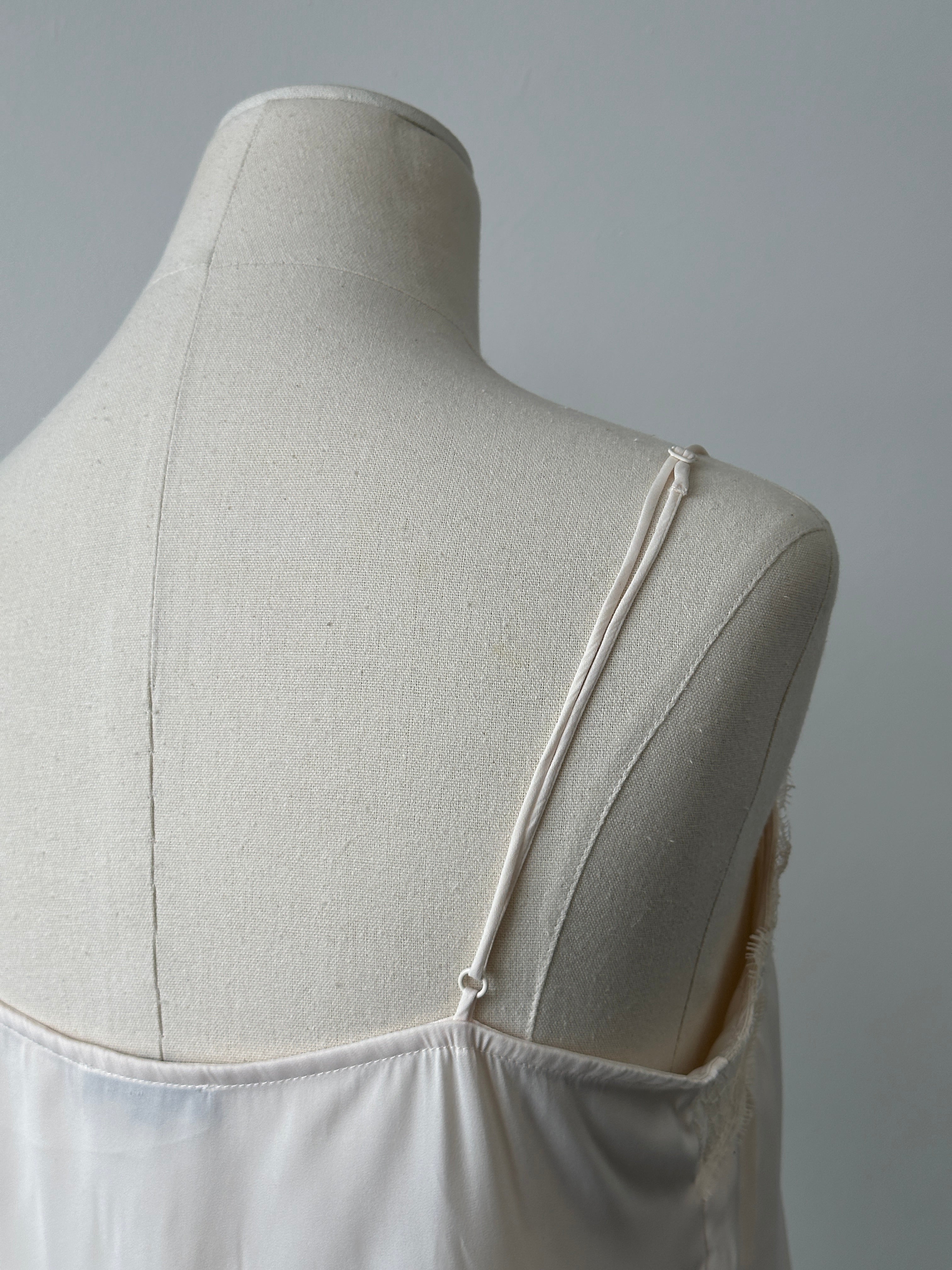 Vintage 2000s satin lace top in size M, featuring delicate lace details and a smooth satin finish.