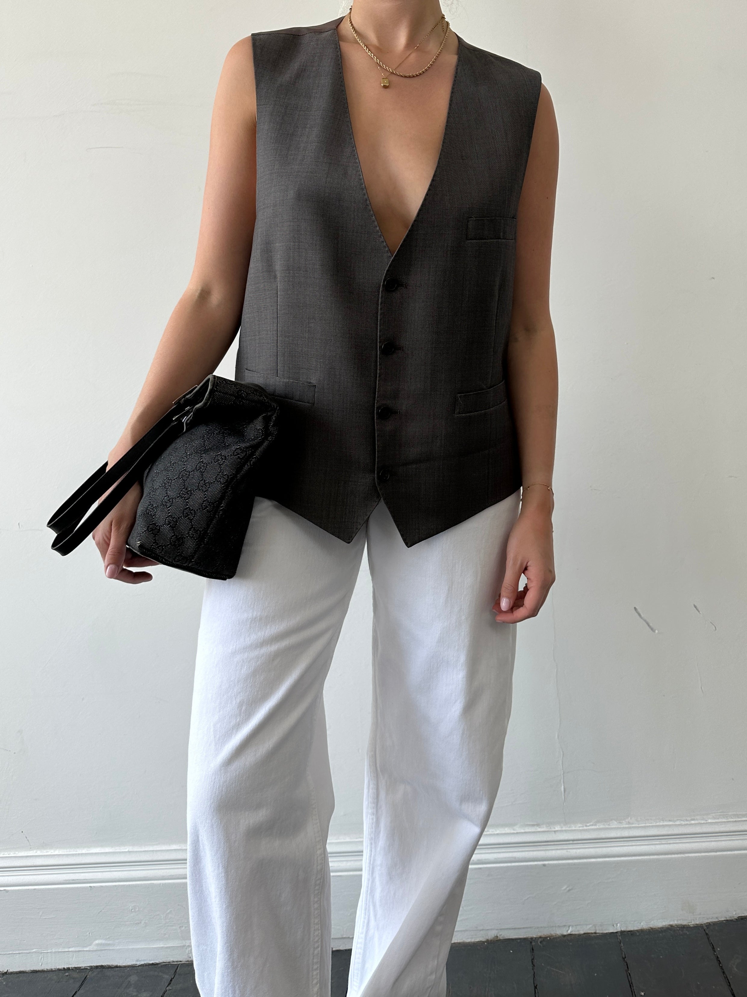 Vintage single-breasted wool blazer from a two-piece suit, size 44/XL, featuring classic tailored design and timeless style.