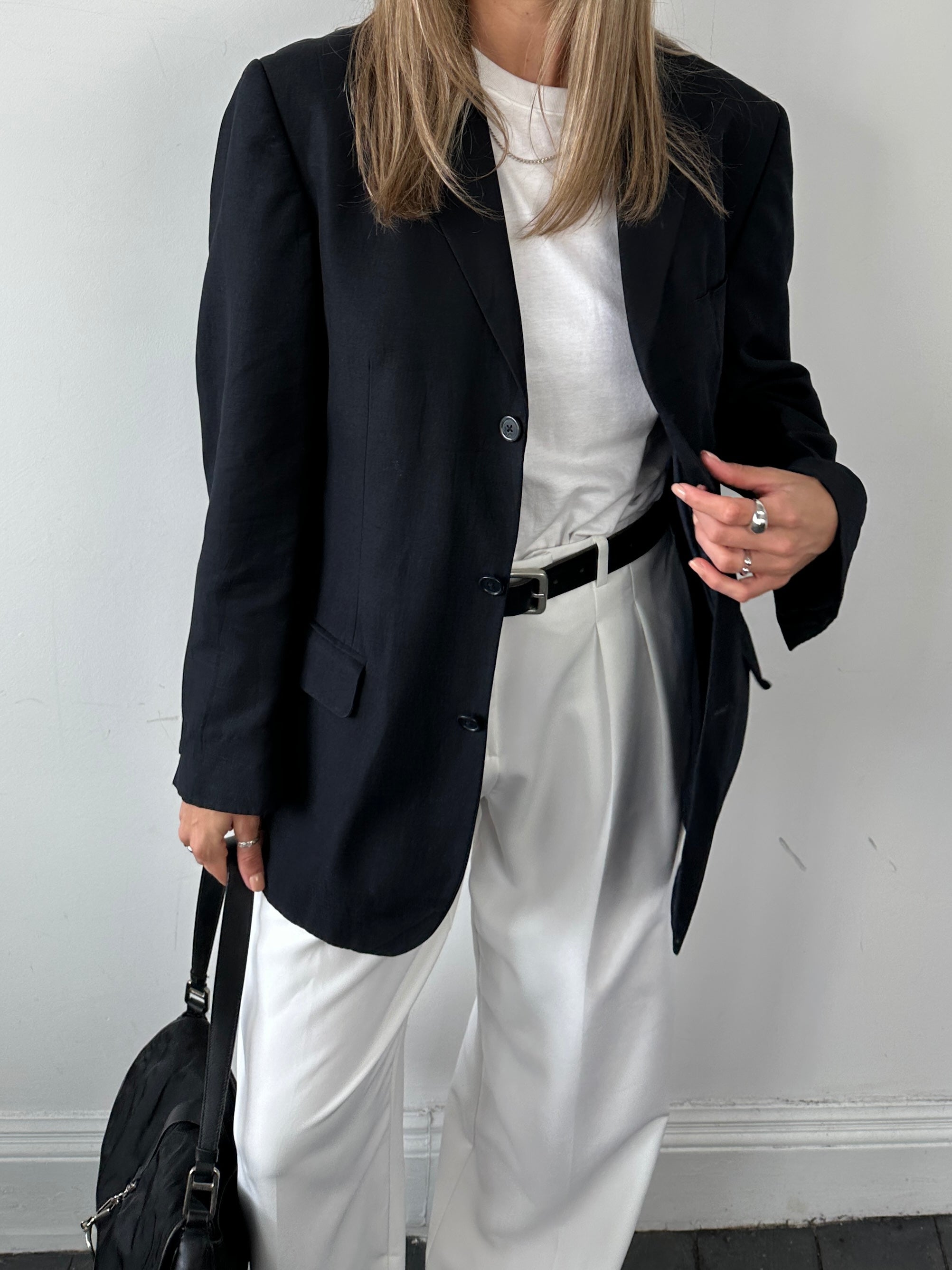 Jaeger silk linen single-breasted blazer in size 42R/M, shown in a tailored fit with classic lapel and neutral color.