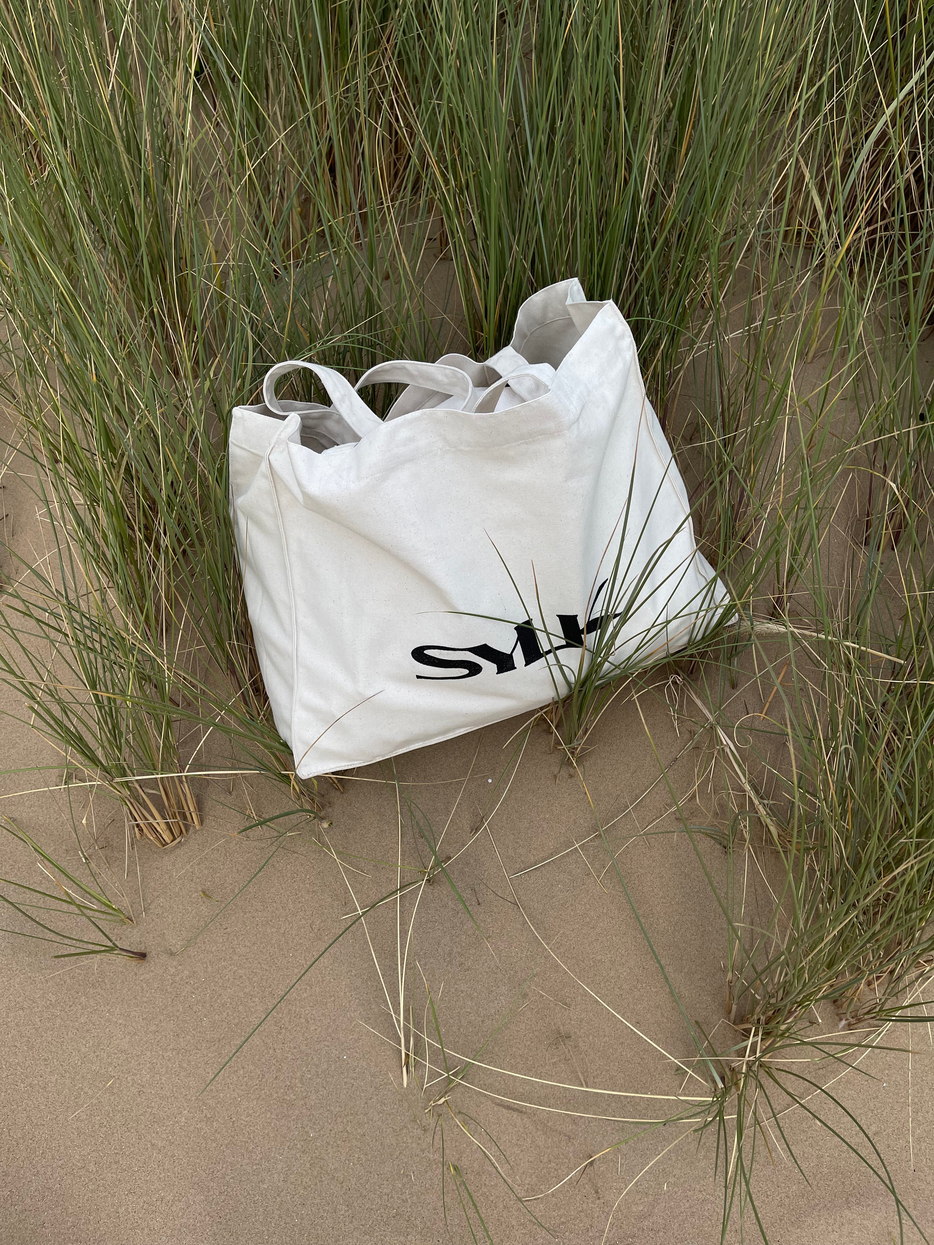 SYLK recycled cotton tote bag with natural handles, eco-friendly reusable bag for shopping and everyday use.