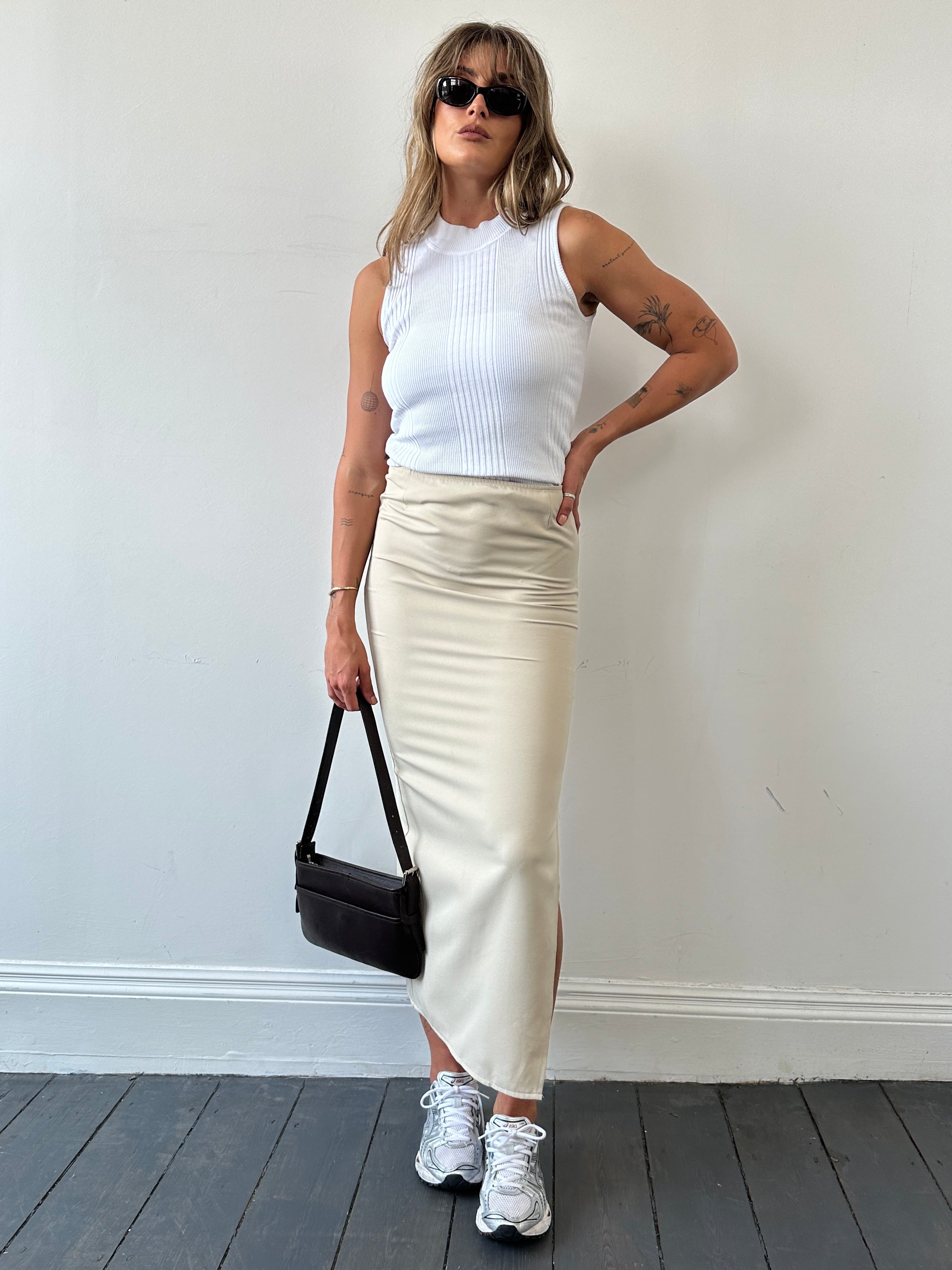 St Michael ribbed cotton sleeveless vest in size M, featuring a fitted design and ribbed texture, displayed on a neutral background.