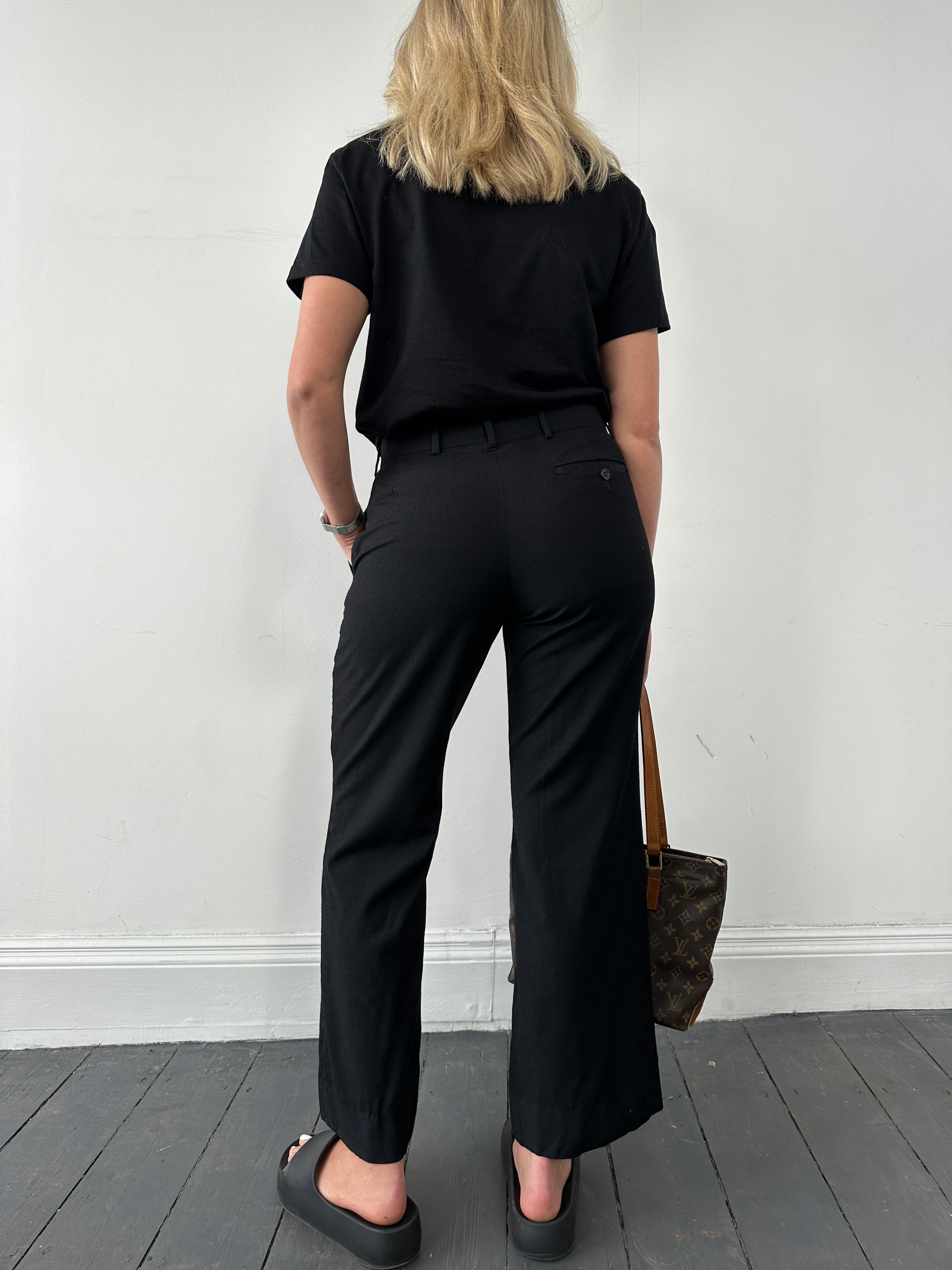 Vintage straight leg wool tailored trousers in size W30, showcasing classic design and clean tailoring.