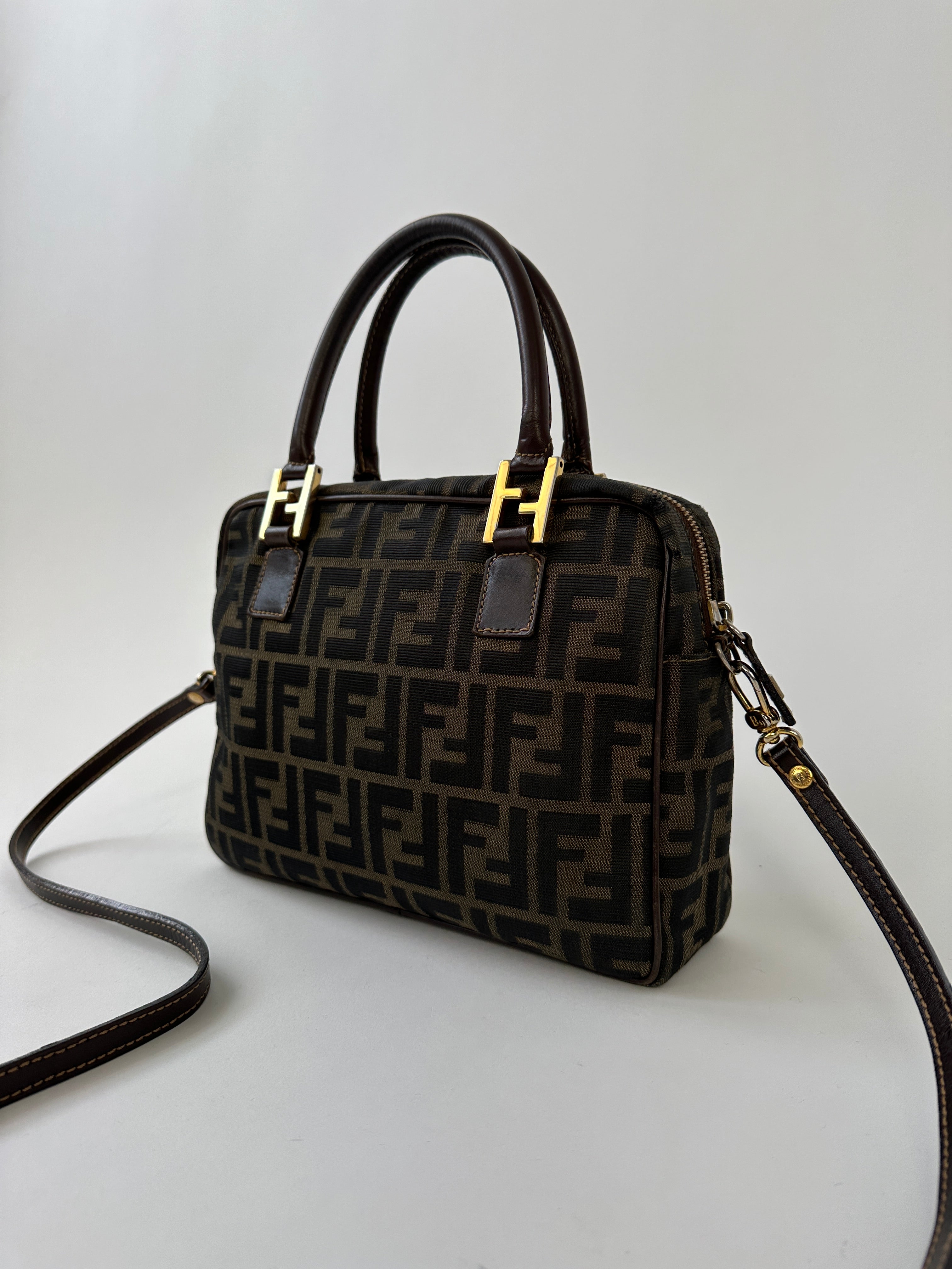 Fendi Zucca Monogram Crossbody Bag with adjustable strap, featuring signature Fendi logo and classic brown and beige monogram pattern.