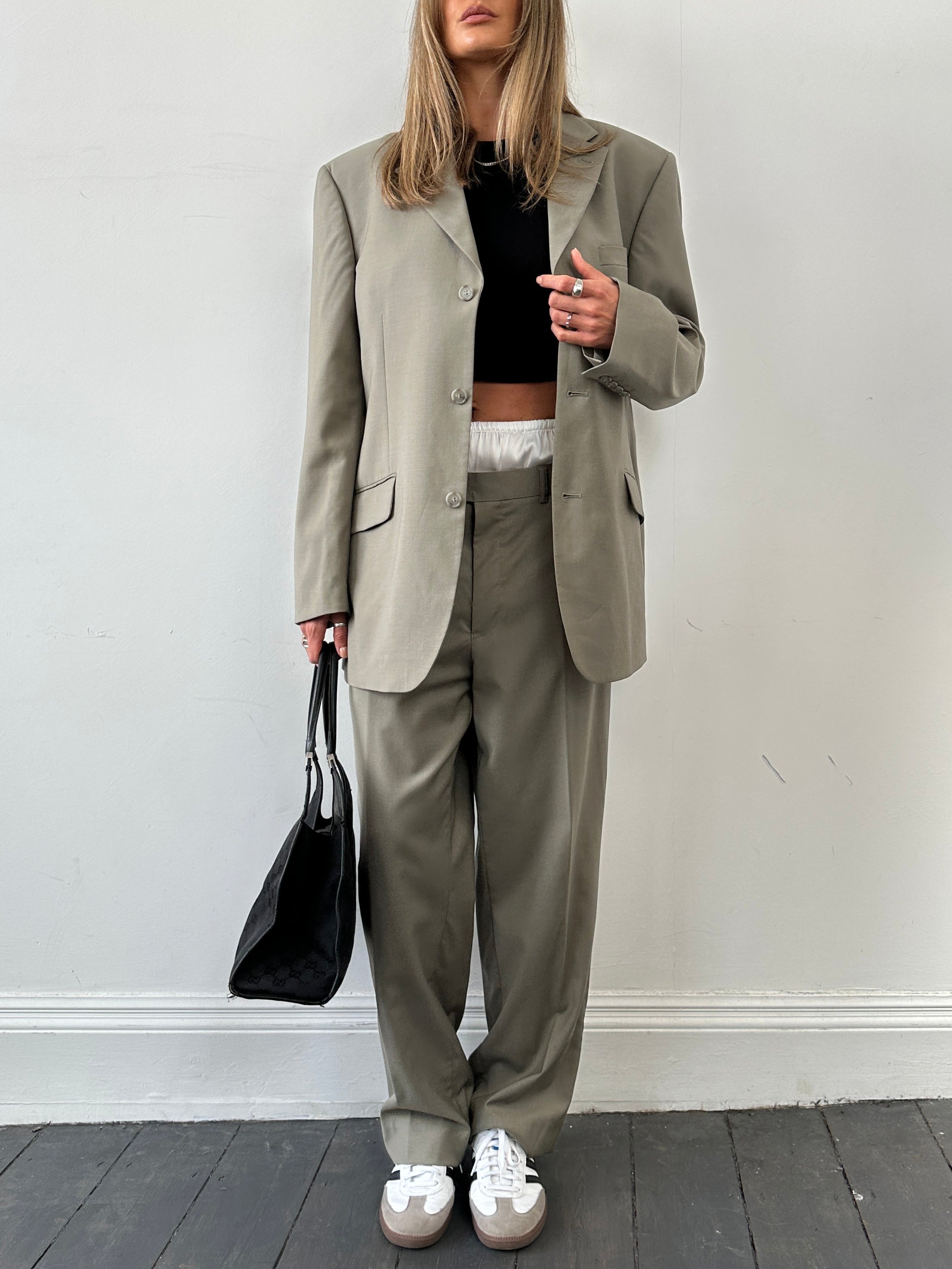 Vintage wool single-breasted jumpsuit in size 44R/W34, featuring classic tailoring and a vintage-inspired design.