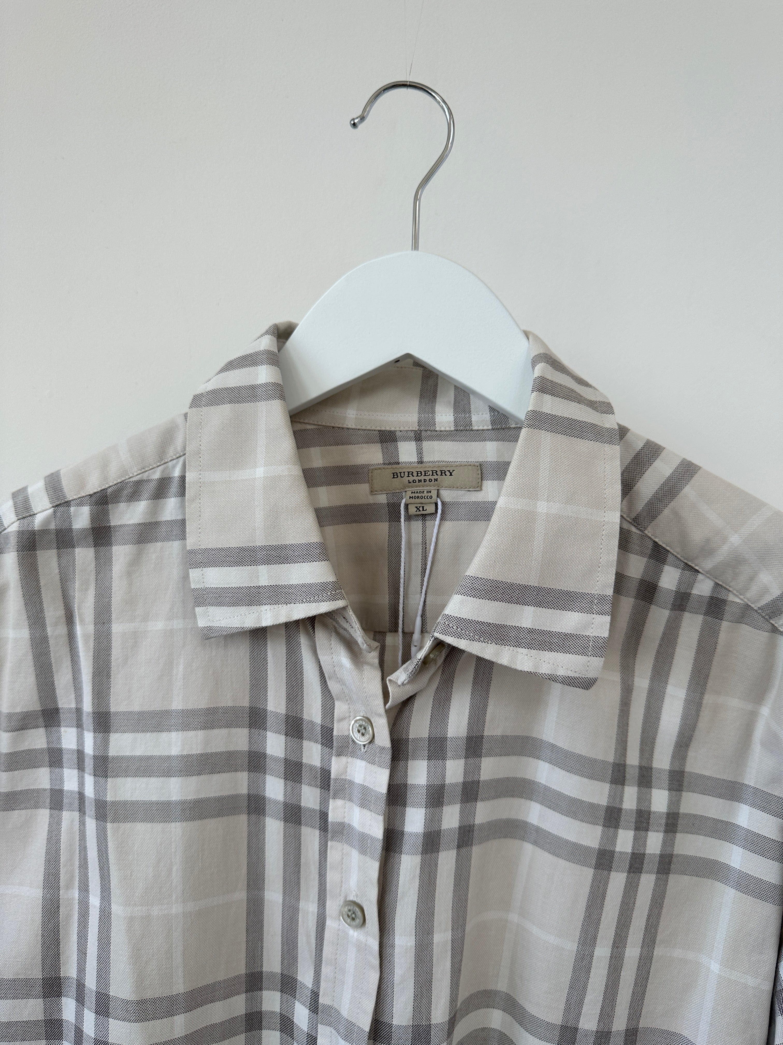 Burberry London Check cotton shirt in size large, featuring signature plaid pattern and classic button-down design.