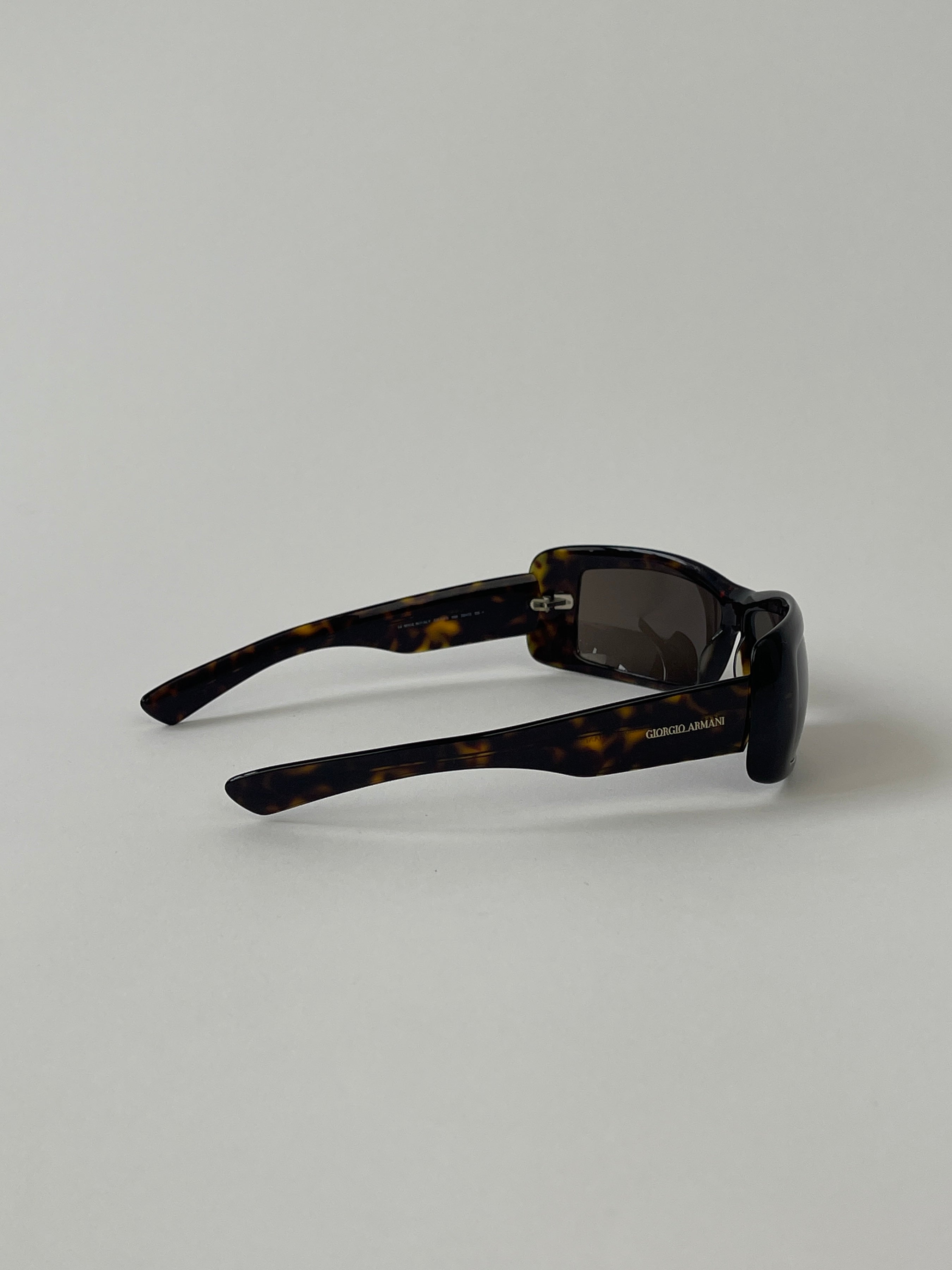 Giorgio Armani rectangle tortoise shell sunglasses with brown gradient lenses and sturdy frame, stylish and elegant eyewear.